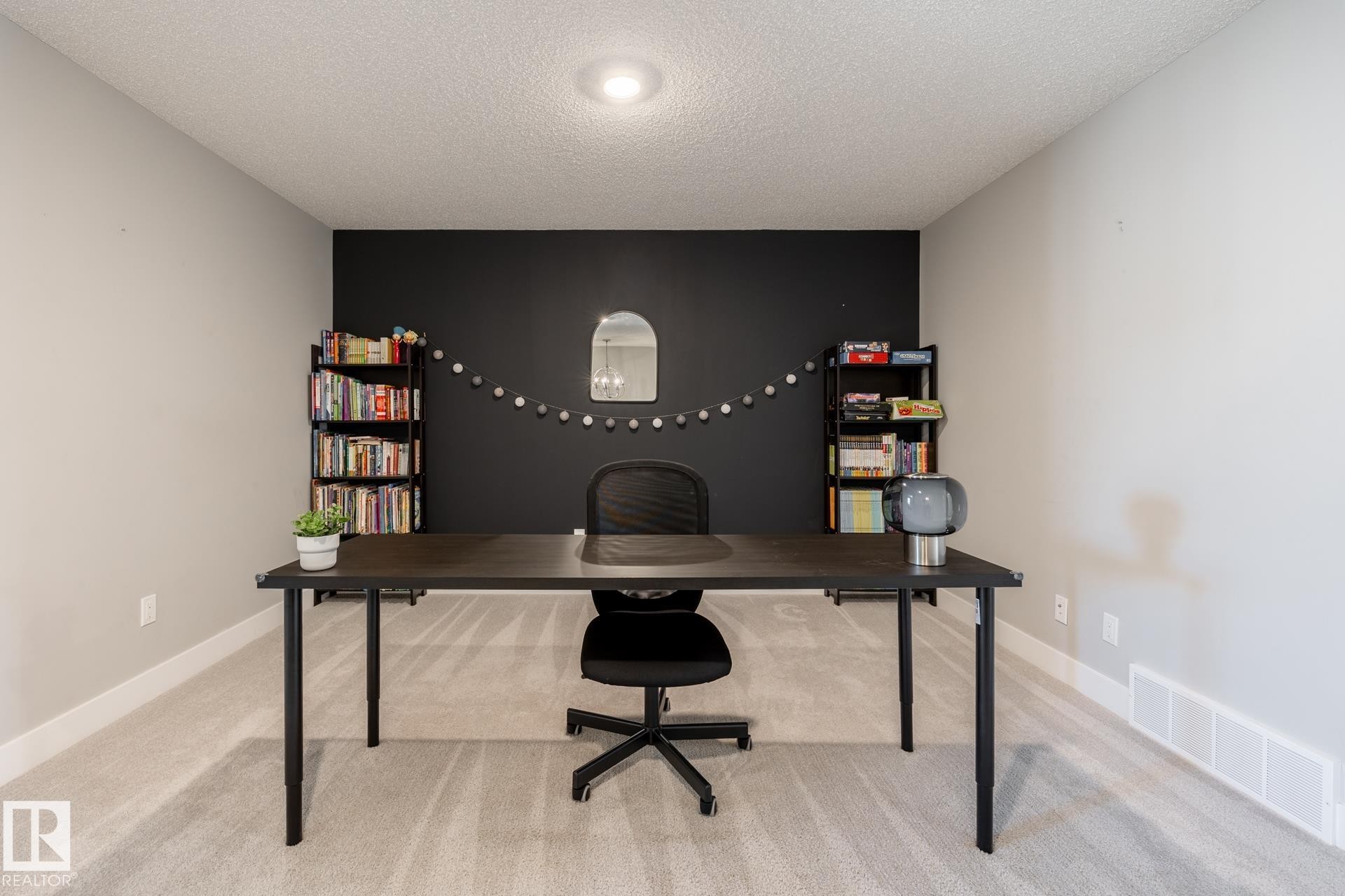 Office space with light colored carpet and a textured ceiling - 1440 Darby Green, Edmonton, AB - Indoor Photo Showing Office