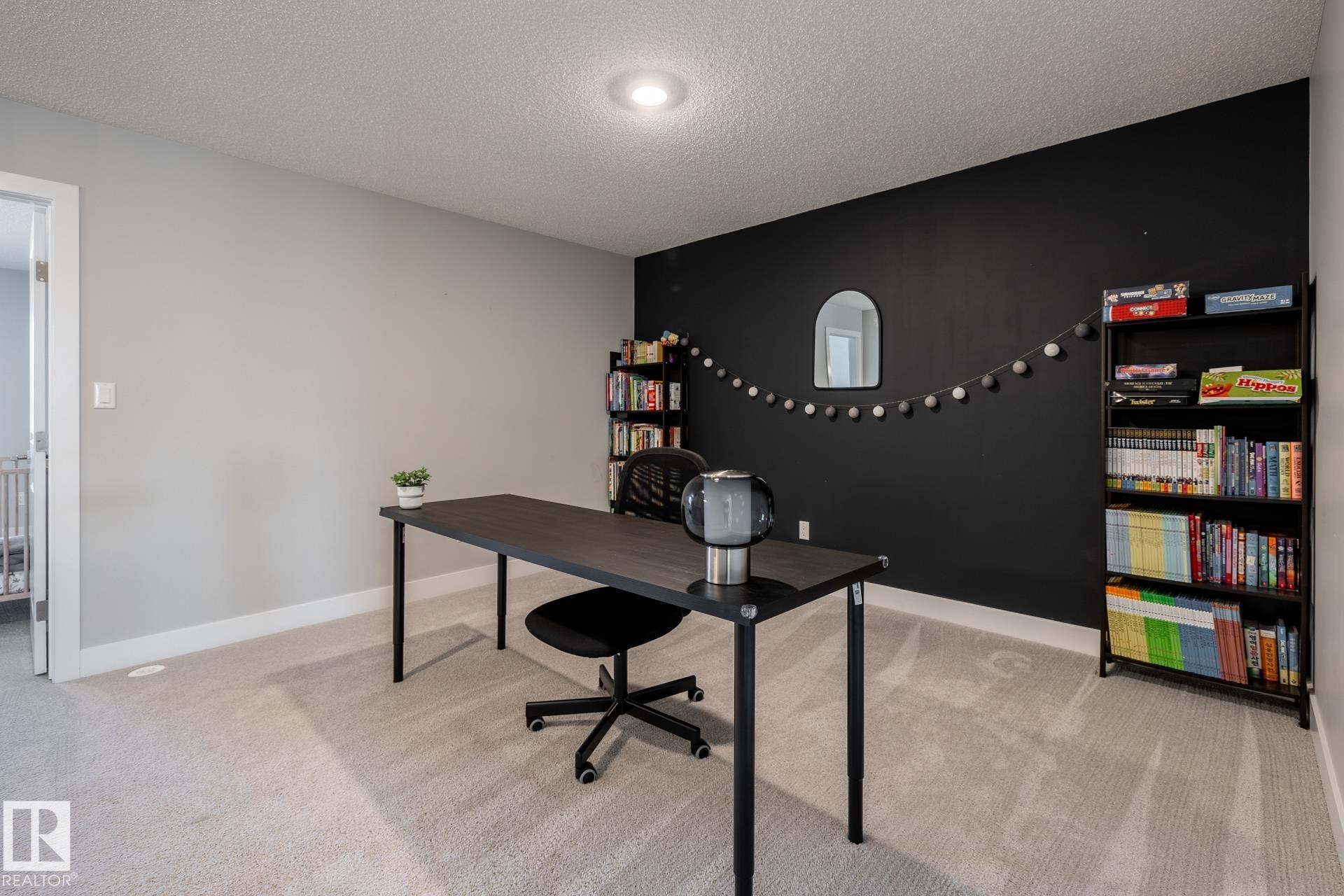 Office area with light colored carpet and a textured ceiling - 1440 Darby Green, Edmonton, AB - Indoor Photo Showing Office