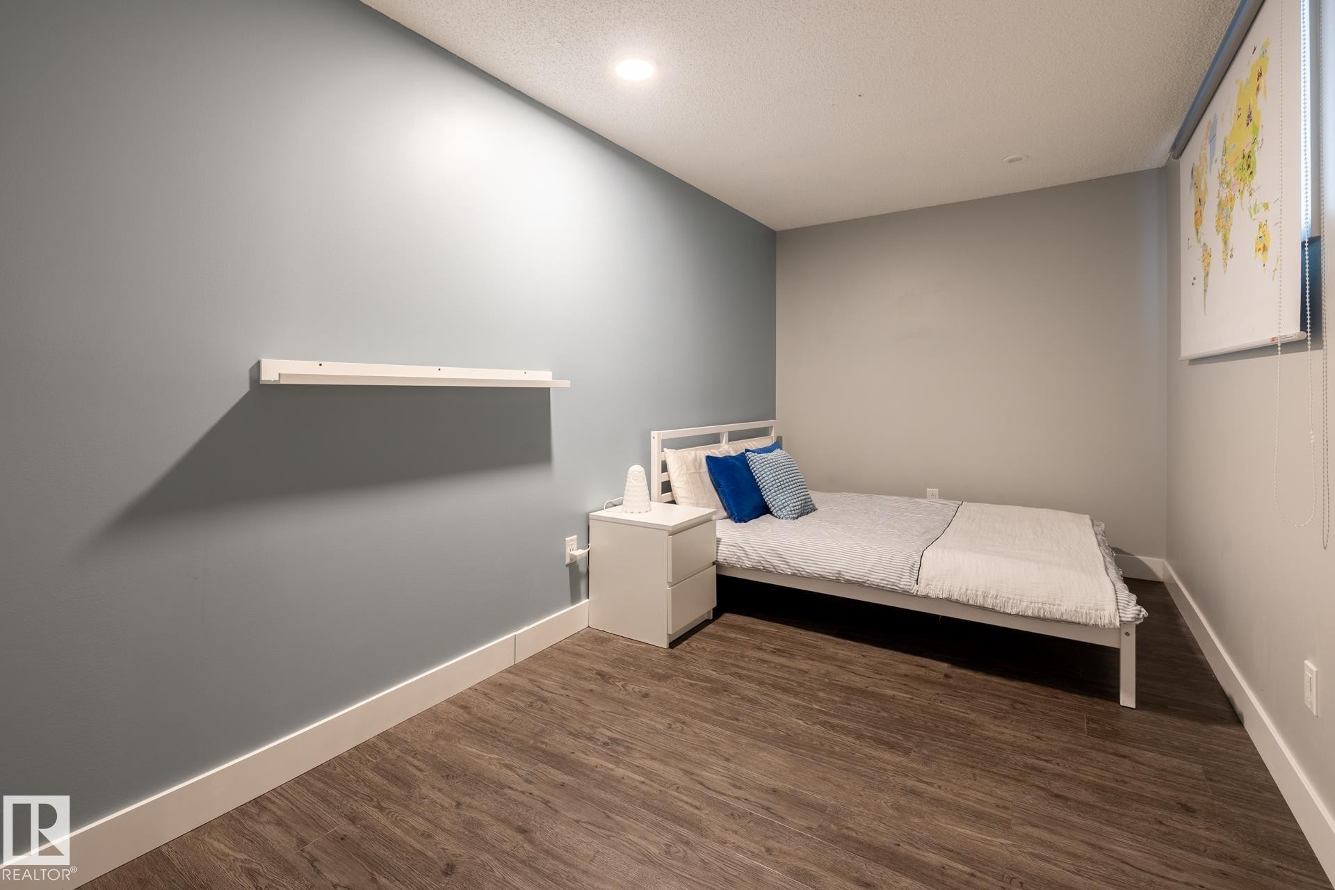 Bedroom featuring dark wood-type flooring and recessed lighting - 1440 Darby Green, Edmonton, AB - Indoor Photo Showing Bedroom