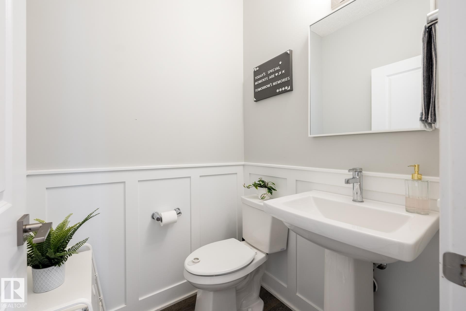 Bathroom with a decorative wall and a wainscoted wall - 1440 Darby Green, Edmonton, AB - Indoor Photo Showing Bathroom