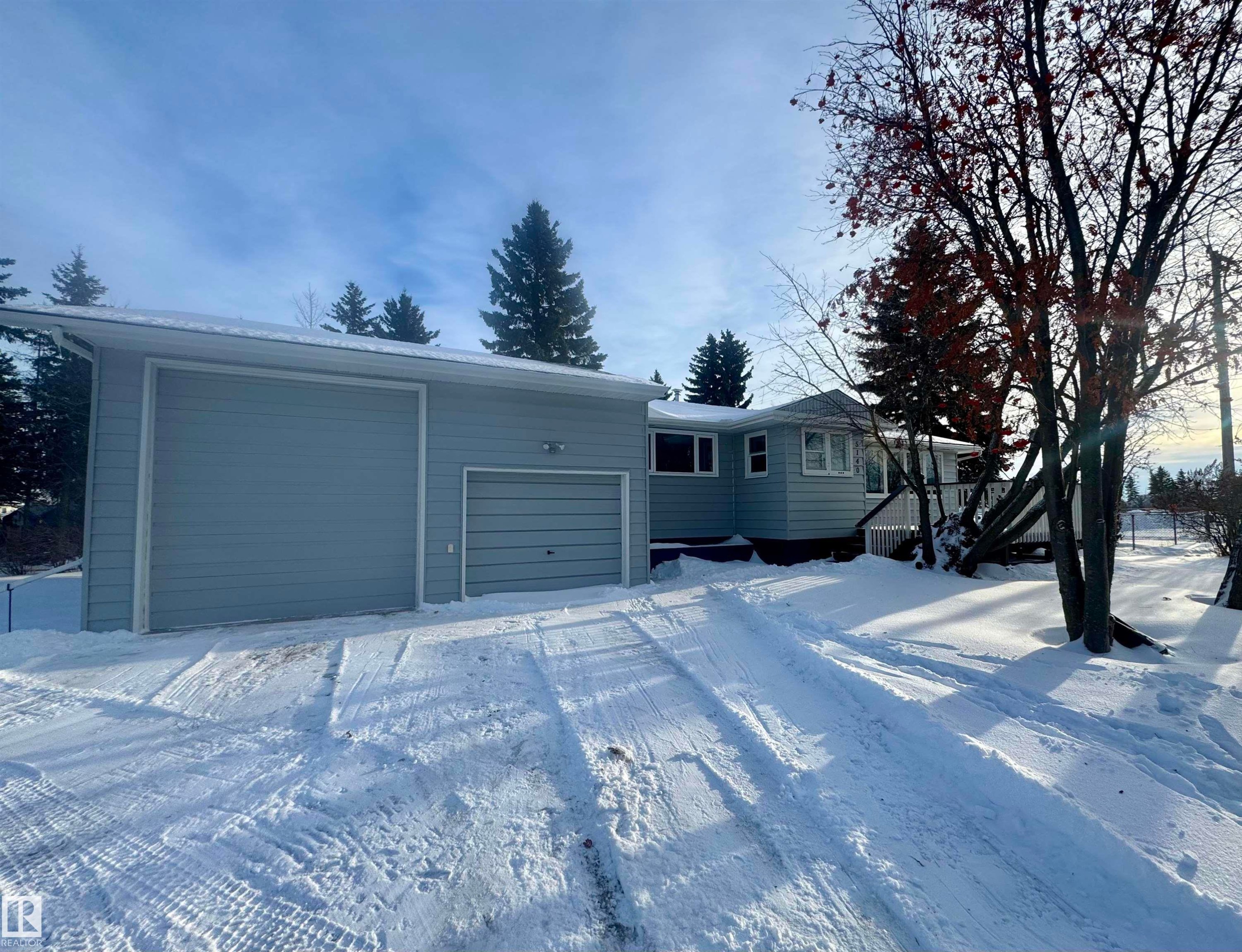 Single story home featuring an attached garage - 5140 52 Avenue, Ryley, AB - Outdoor