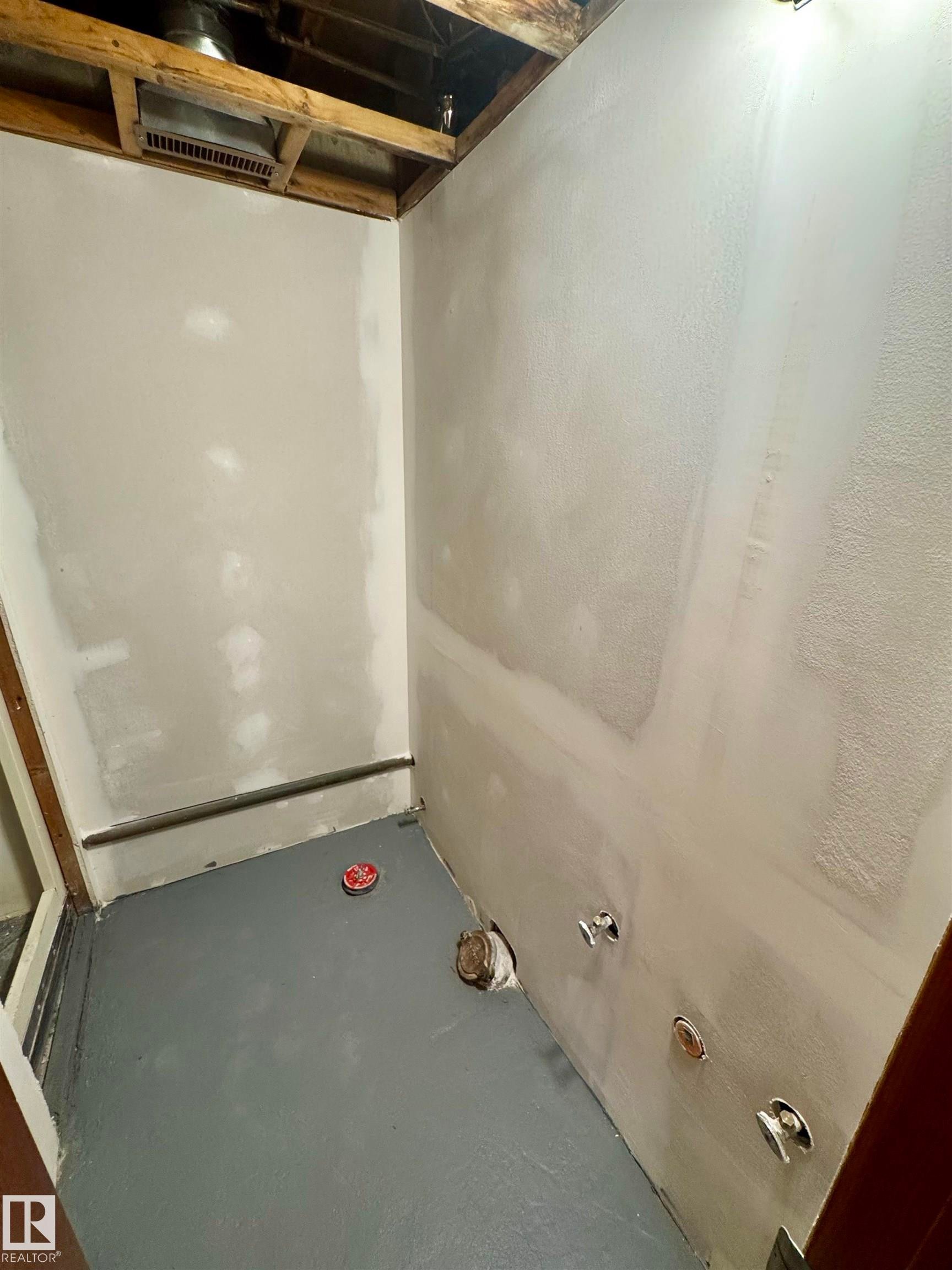 Bathroom featuring concrete flooring - 5140 52 Avenue, Ryley, AB - Indoor Photo Showing Basement