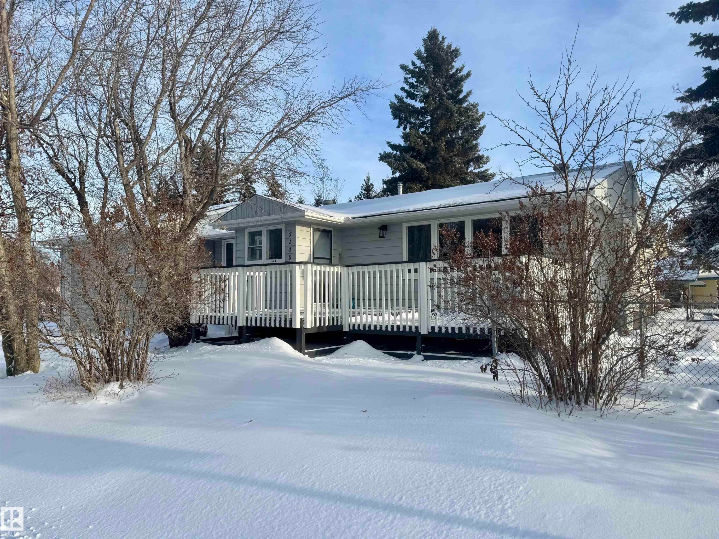 Ranch-style home featuring a deck - 5140 52 Avenue, Ryley, AB - Outdoor With Deck Patio Veranda