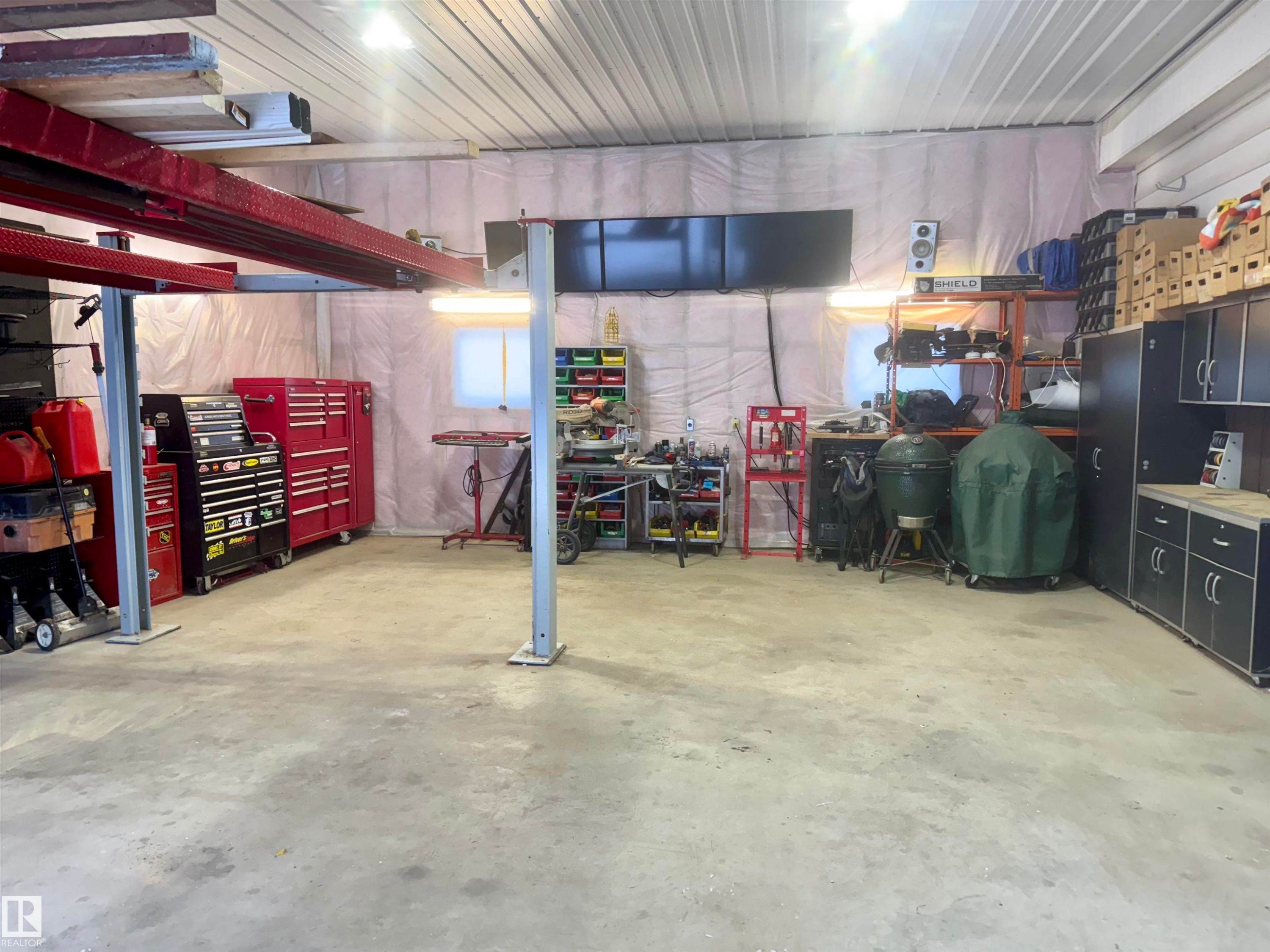 Garage with a workshop area - 5140 52 Avenue, Ryley, AB - Indoor