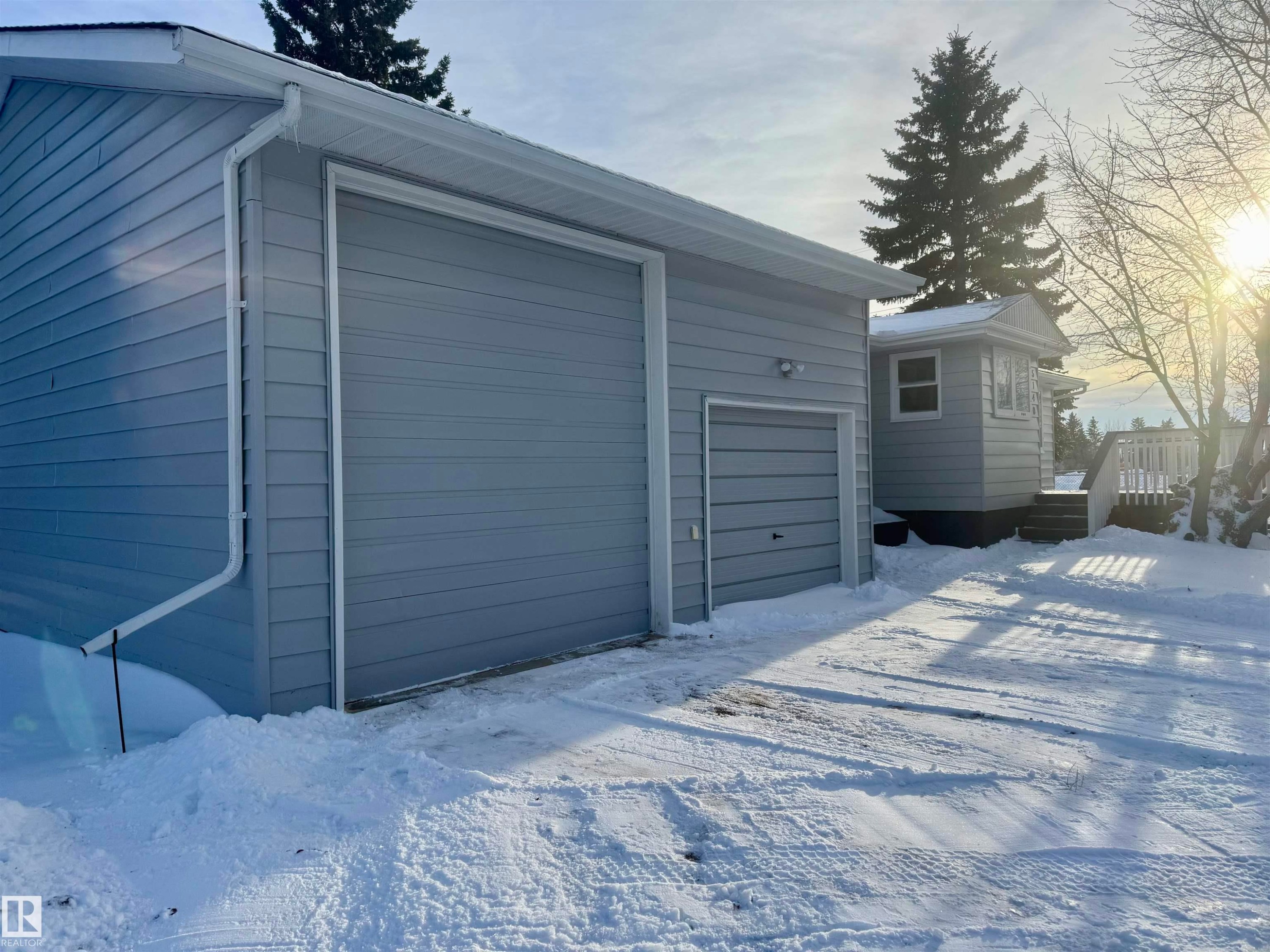 View of snow covered garage - 5140 52 Avenue, Ryley, AB - Outdoor