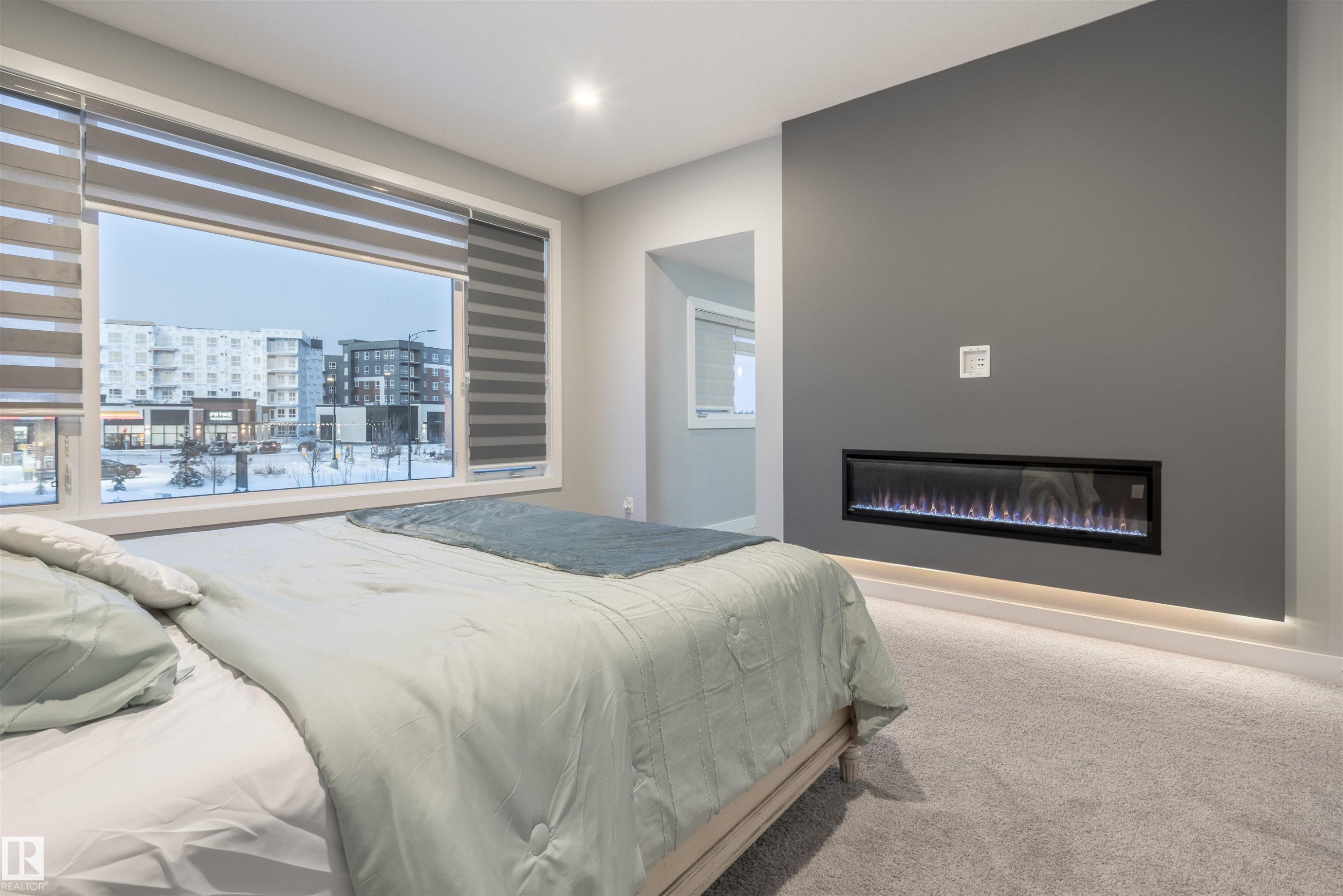 2118 Cavanagh Drive, Edmonton, AB - Indoor Photo Showing Bedroom With Fireplace