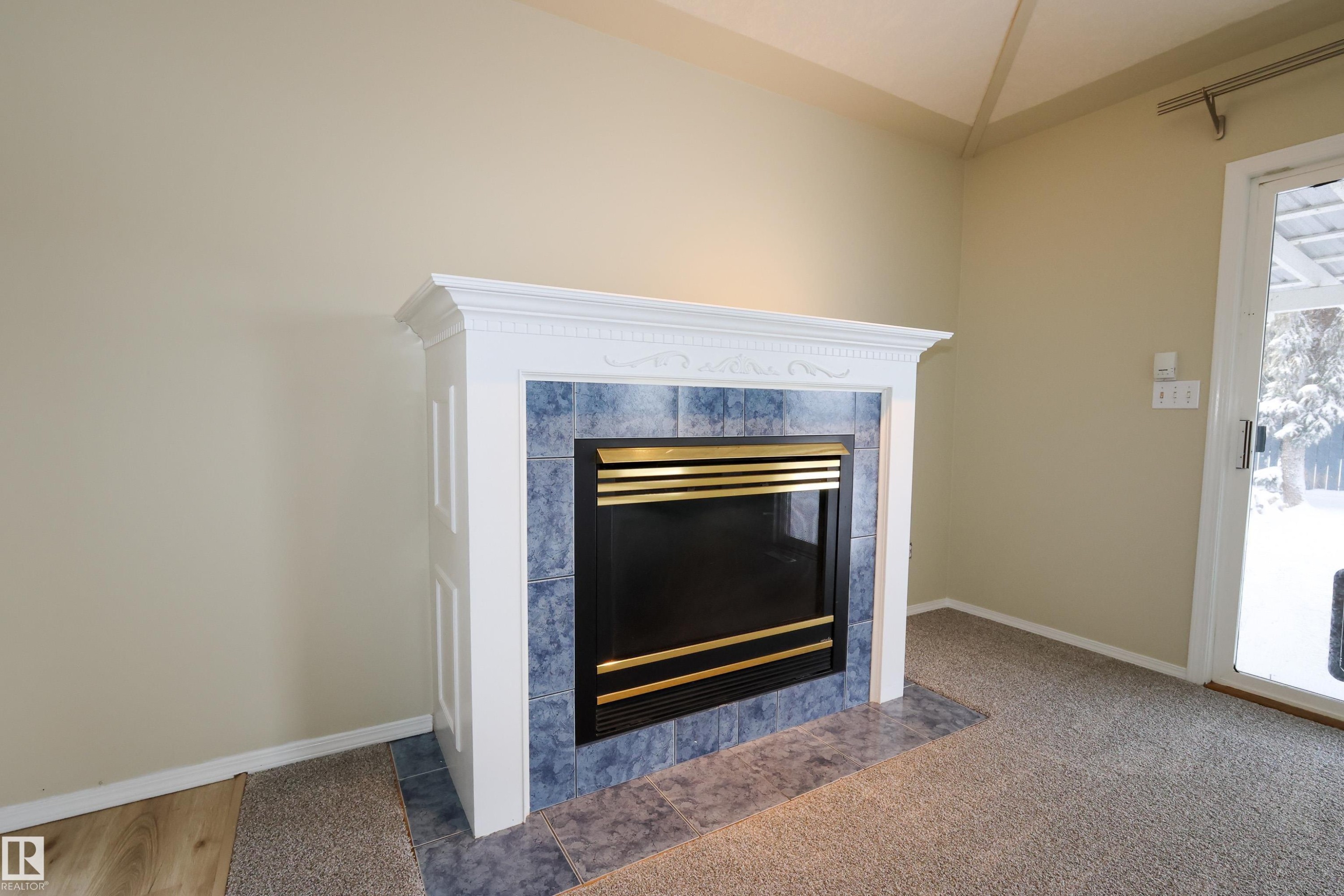 Morinville, AB - Indoor With Fireplace