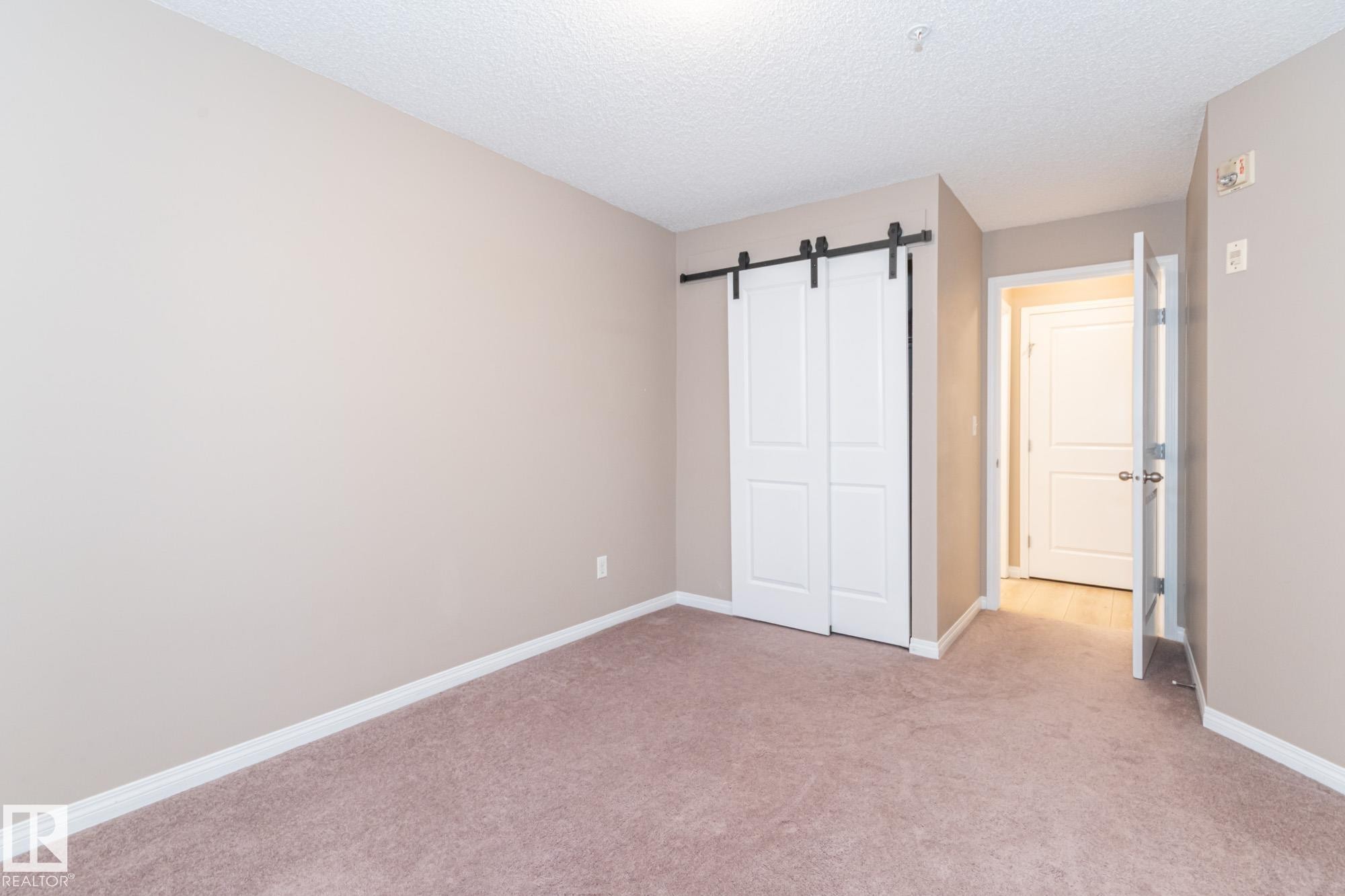 119 245 Edwards Drive, Edmonton, AB - Indoor Photo Showing Other Room