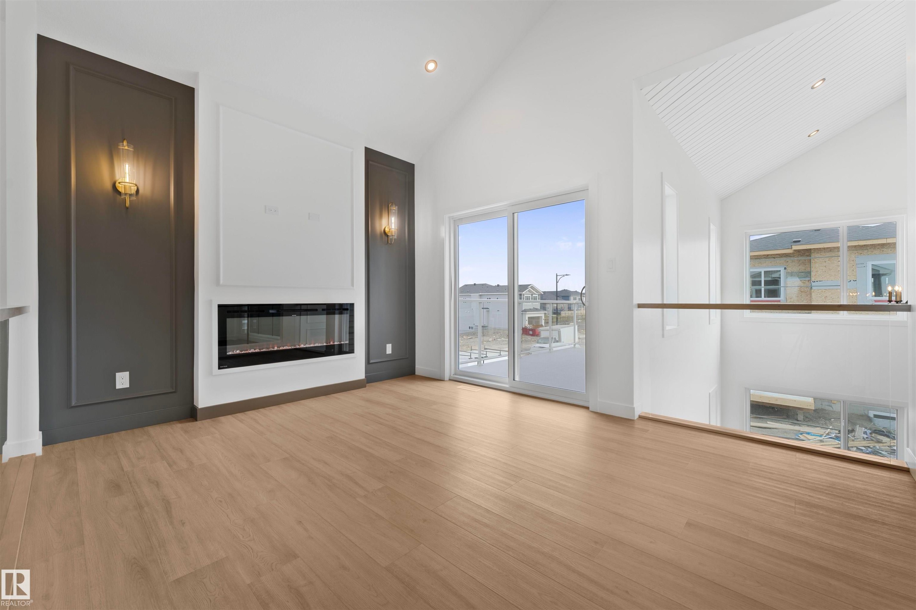 57 Eldridge Point(E), St. Albert, AB - Indoor Photo Showing Other Room With Fireplace