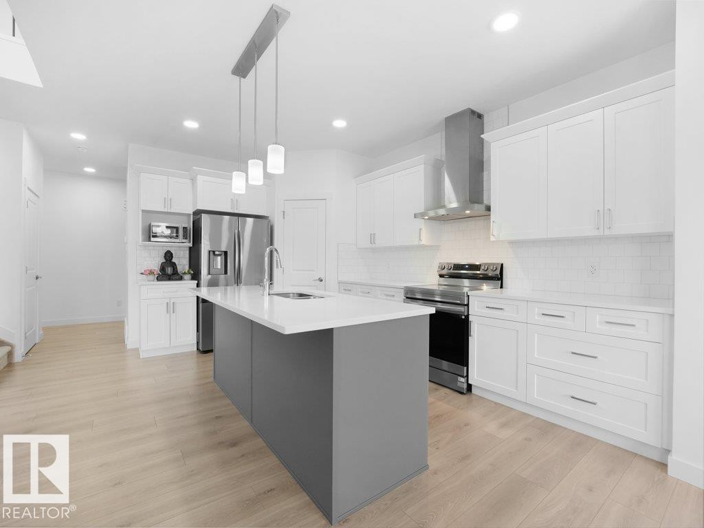 7020 177 Avenue, Edmonton, AB - Indoor Photo Showing Kitchen With Upgraded Kitchen