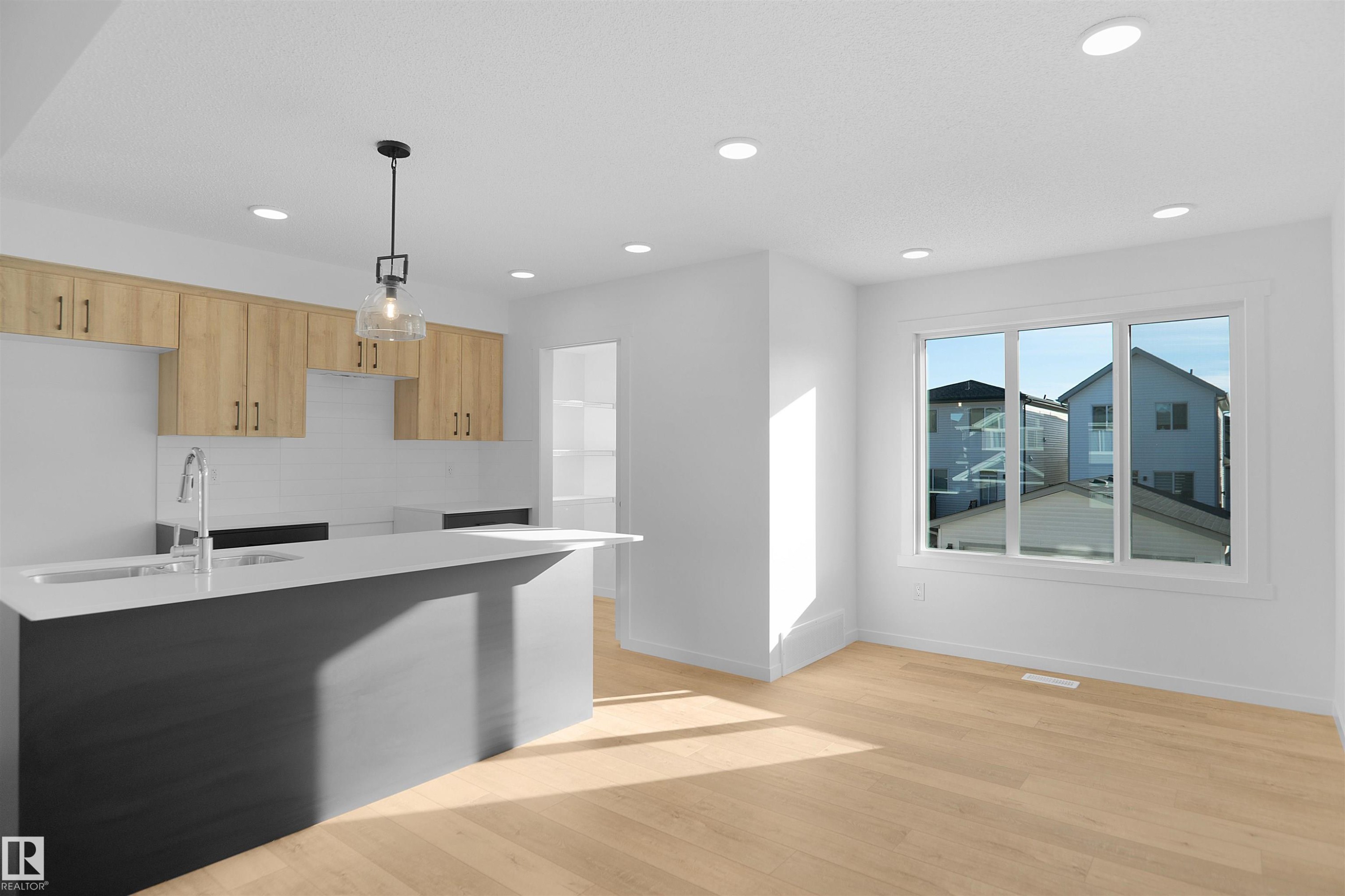 4195 Kinglet Drive, Edmonton, AB - Indoor Photo Showing Kitchen With Double Sink