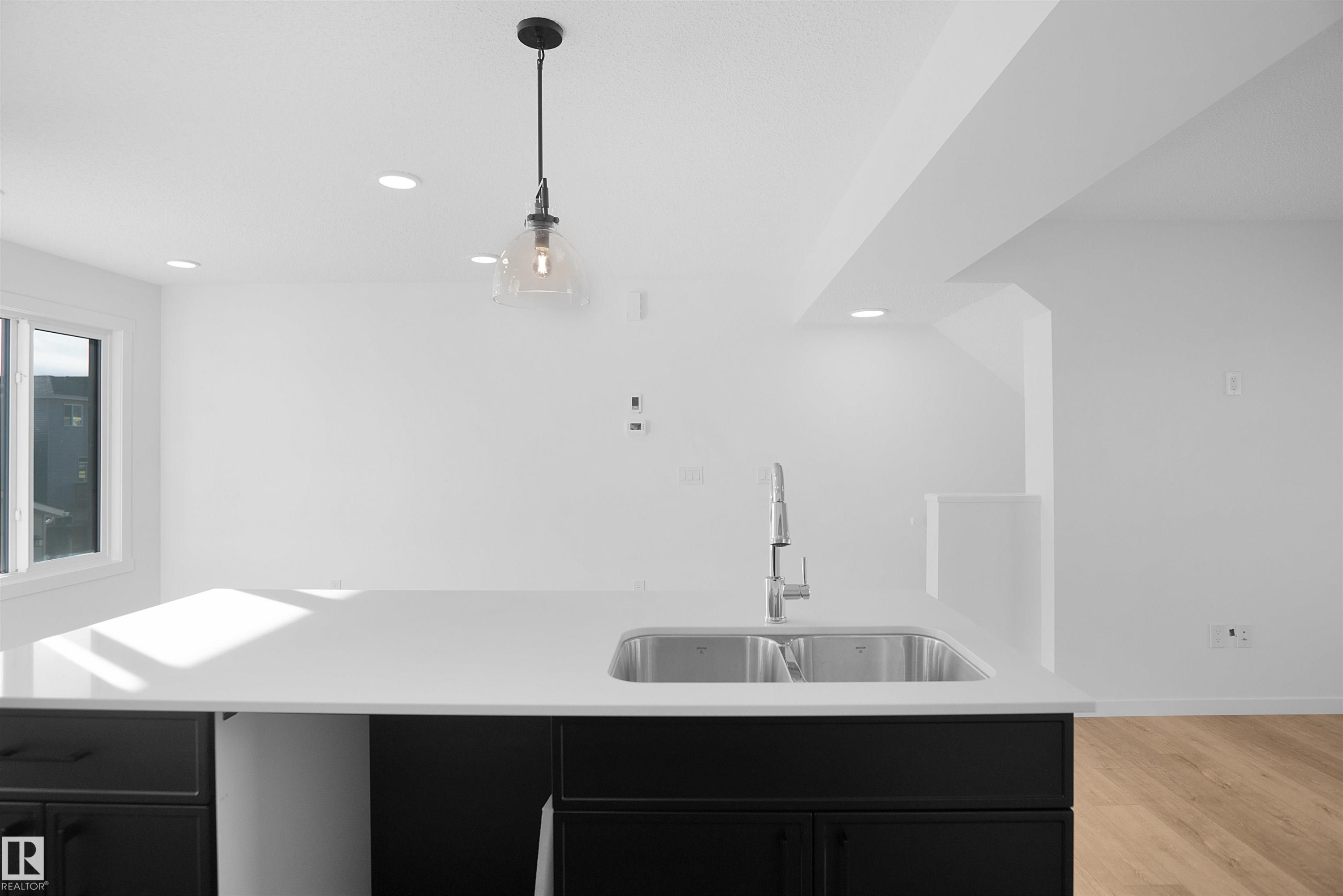 4195 Kinglet Drive, Edmonton, AB - Indoor Photo Showing Kitchen With Double Sink