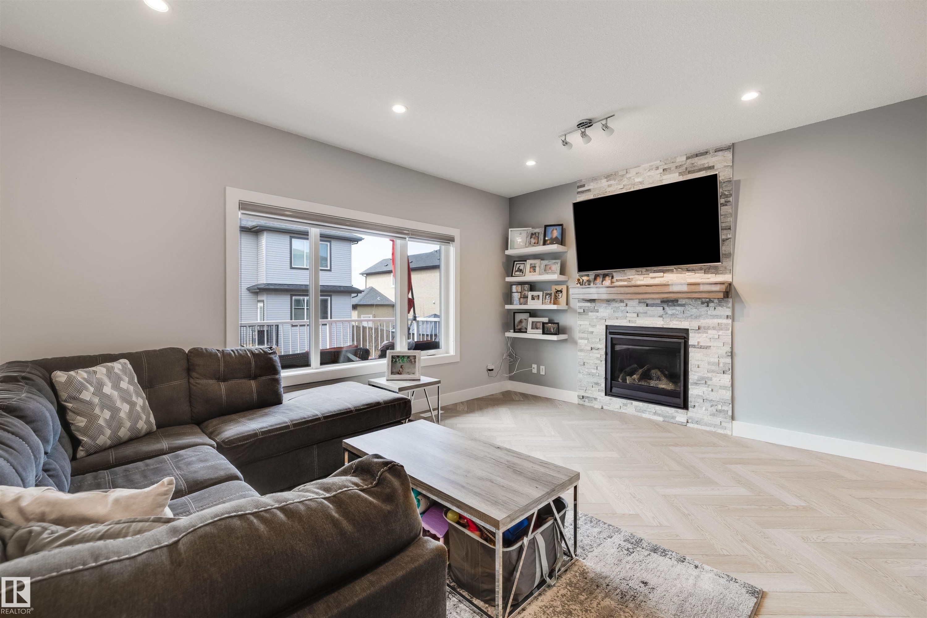3901 44 Avenue, Beaumont, AB - Indoor Photo Showing Living Room With Fireplace