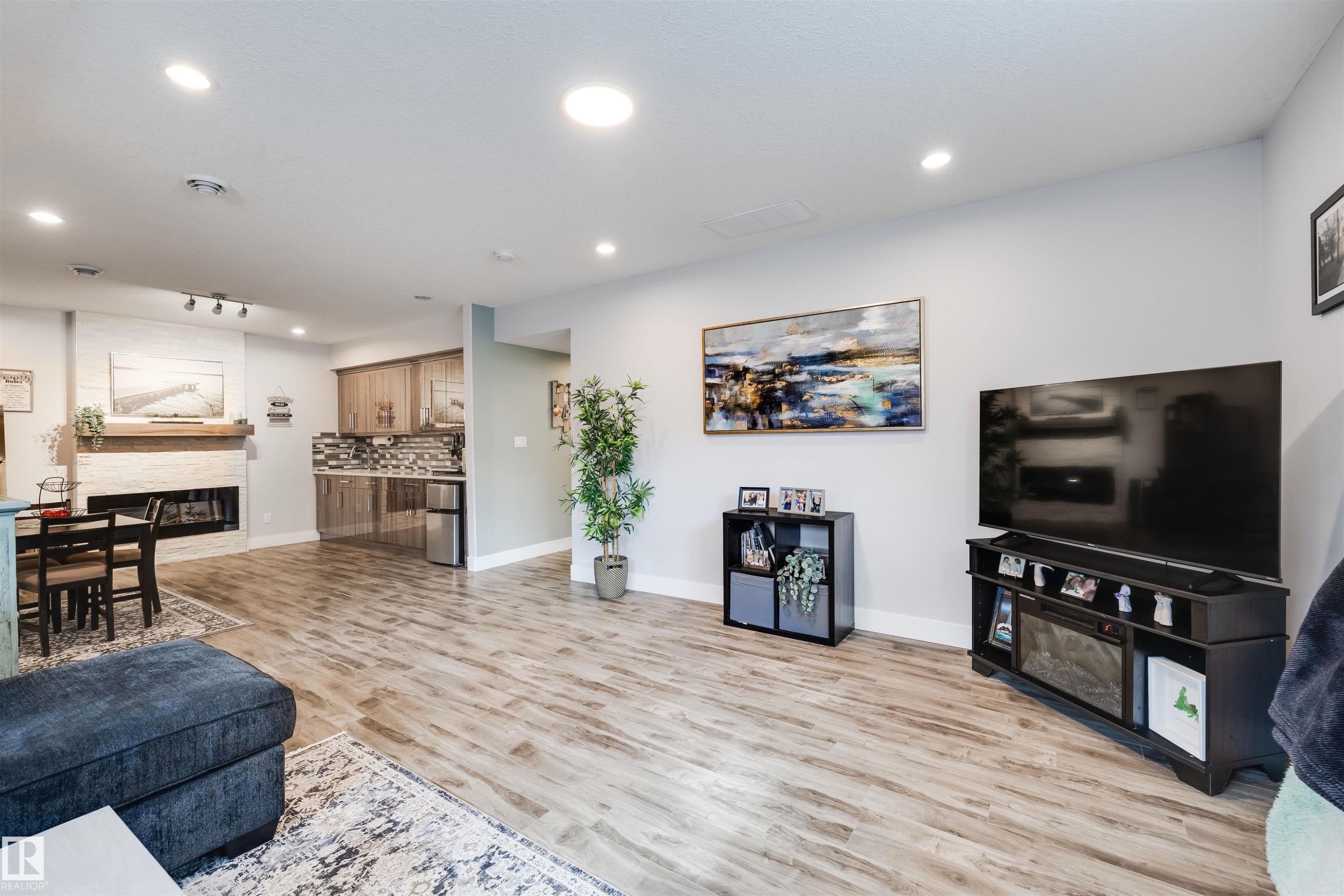 3901 44 Avenue, Beaumont, AB - Indoor Photo Showing Living Room With Fireplace