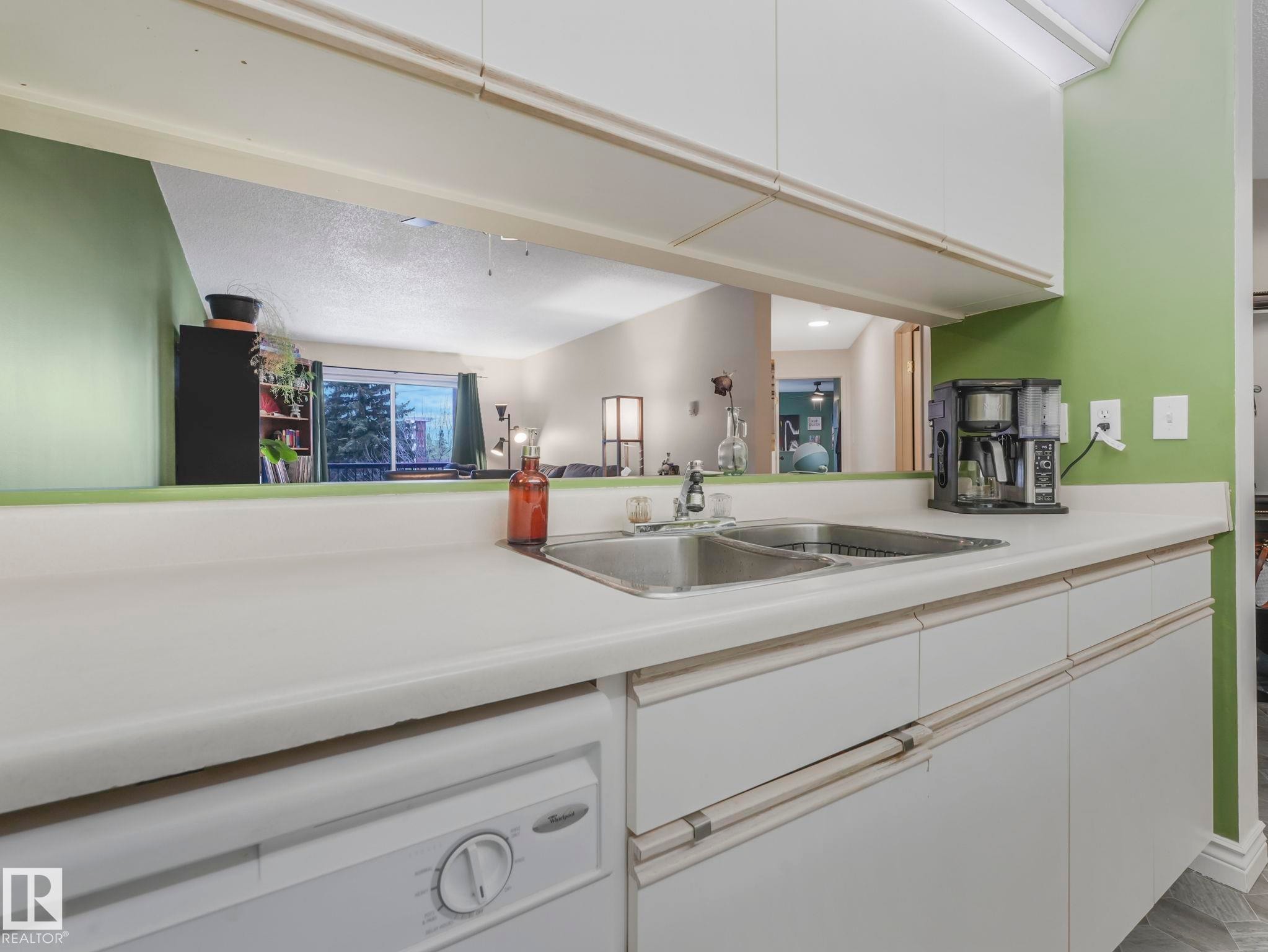 326 10636 120 Street, Edmonton, AB - Indoor Photo Showing Kitchen With Double Sink