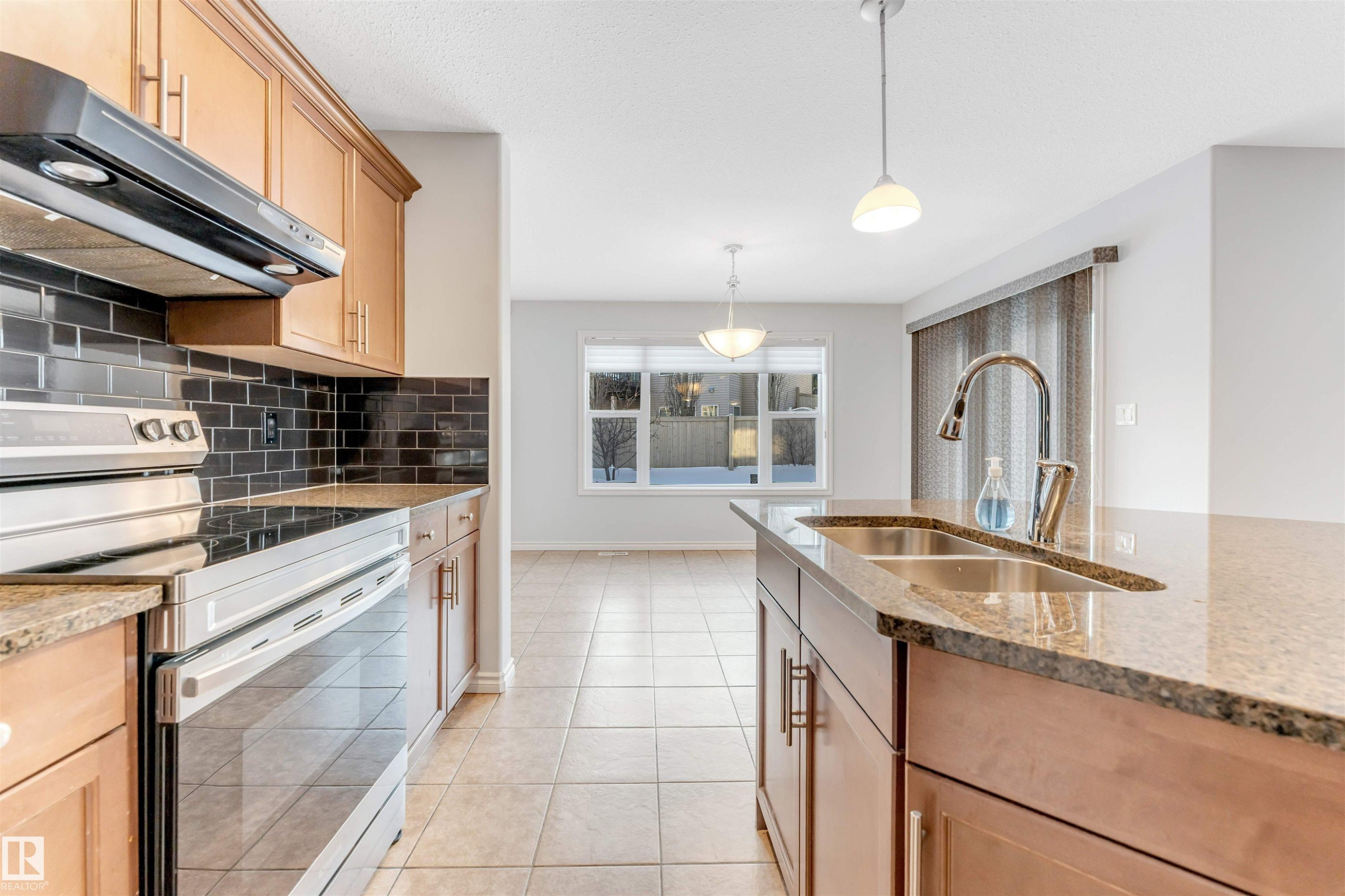 Edmonton, AB - Indoor Photo Showing Kitchen With Double Sink