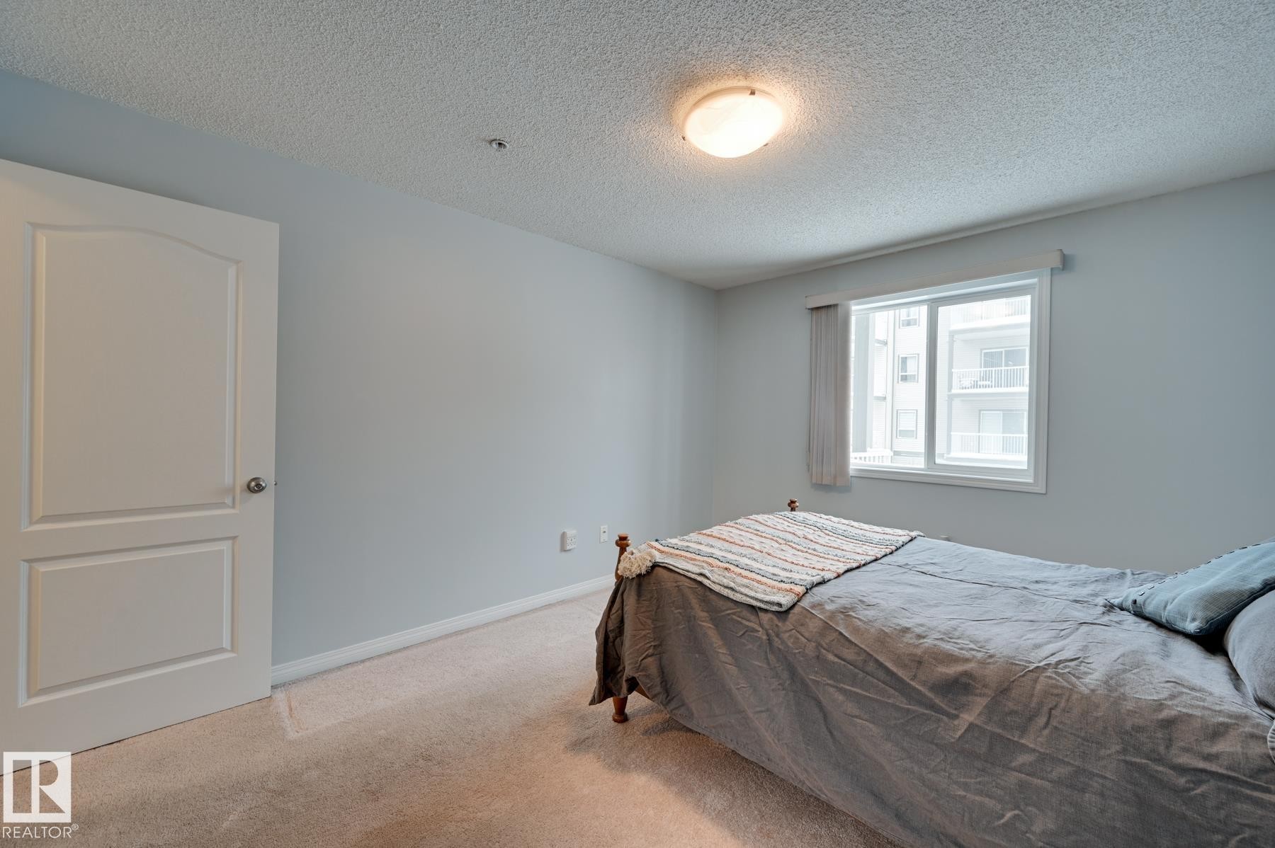 201 155 Edwards Drive, Edmonton, AB - Indoor Photo Showing Bedroom