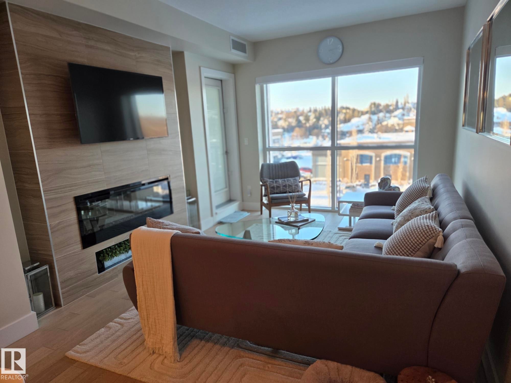 718 200 Bellerose Drive, St. Albert, AB - Indoor Photo Showing Living Room With Fireplace