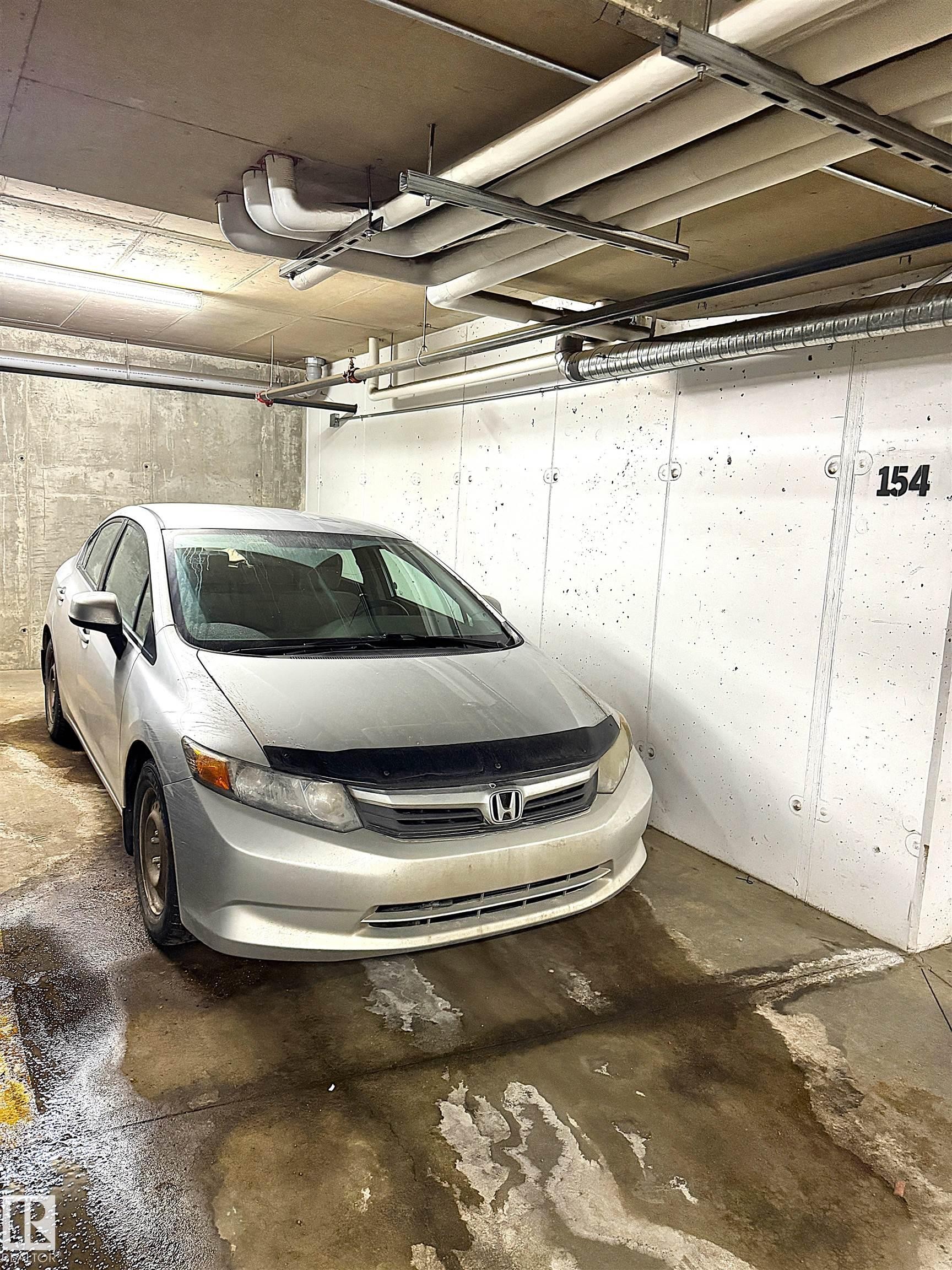 117 5521 7 Avenue, Edmonton, AB - Indoor Photo Showing Garage