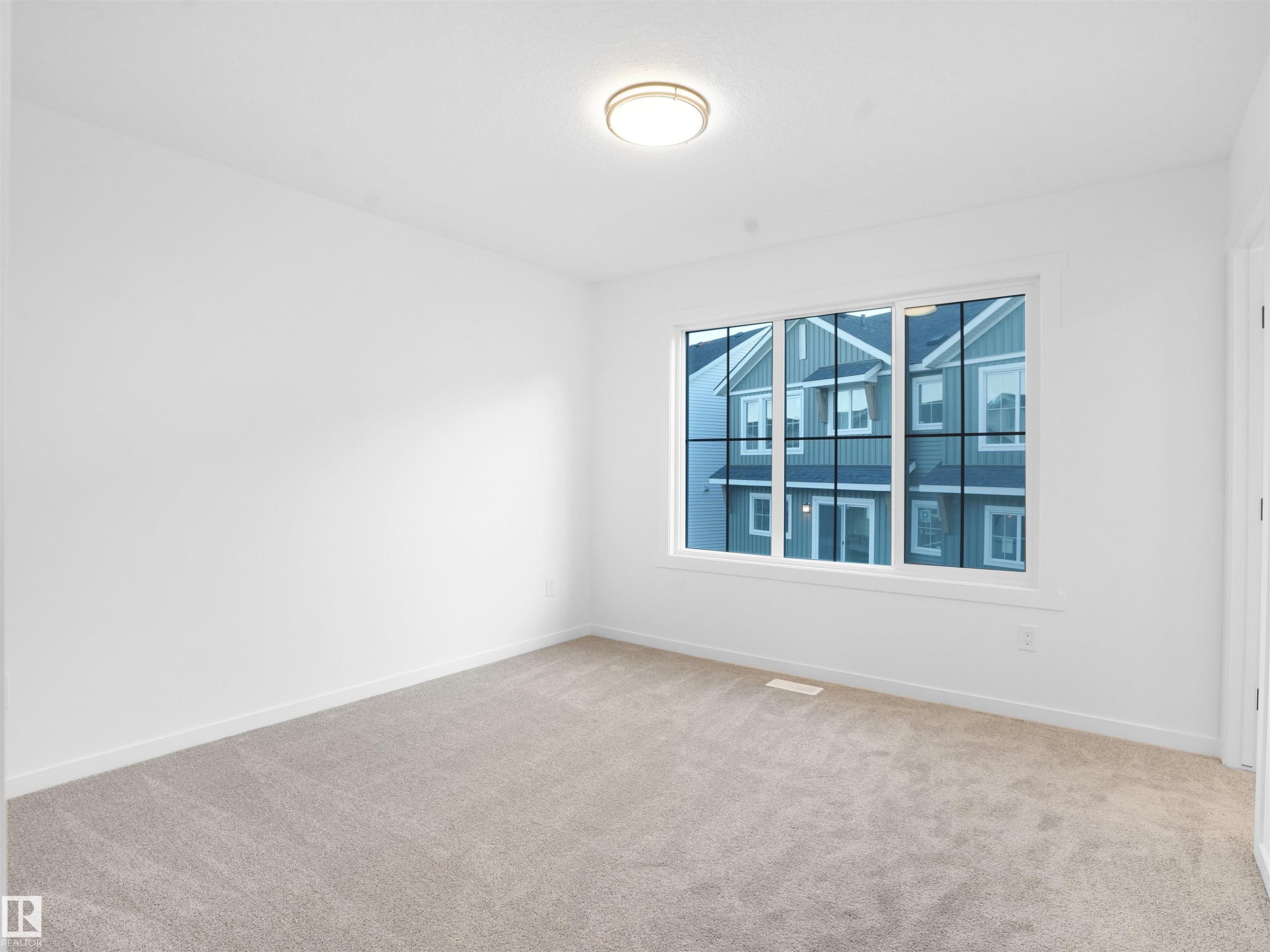 67 525 Secord Boulevard, Edmonton, AB - Indoor Photo Showing Other Room