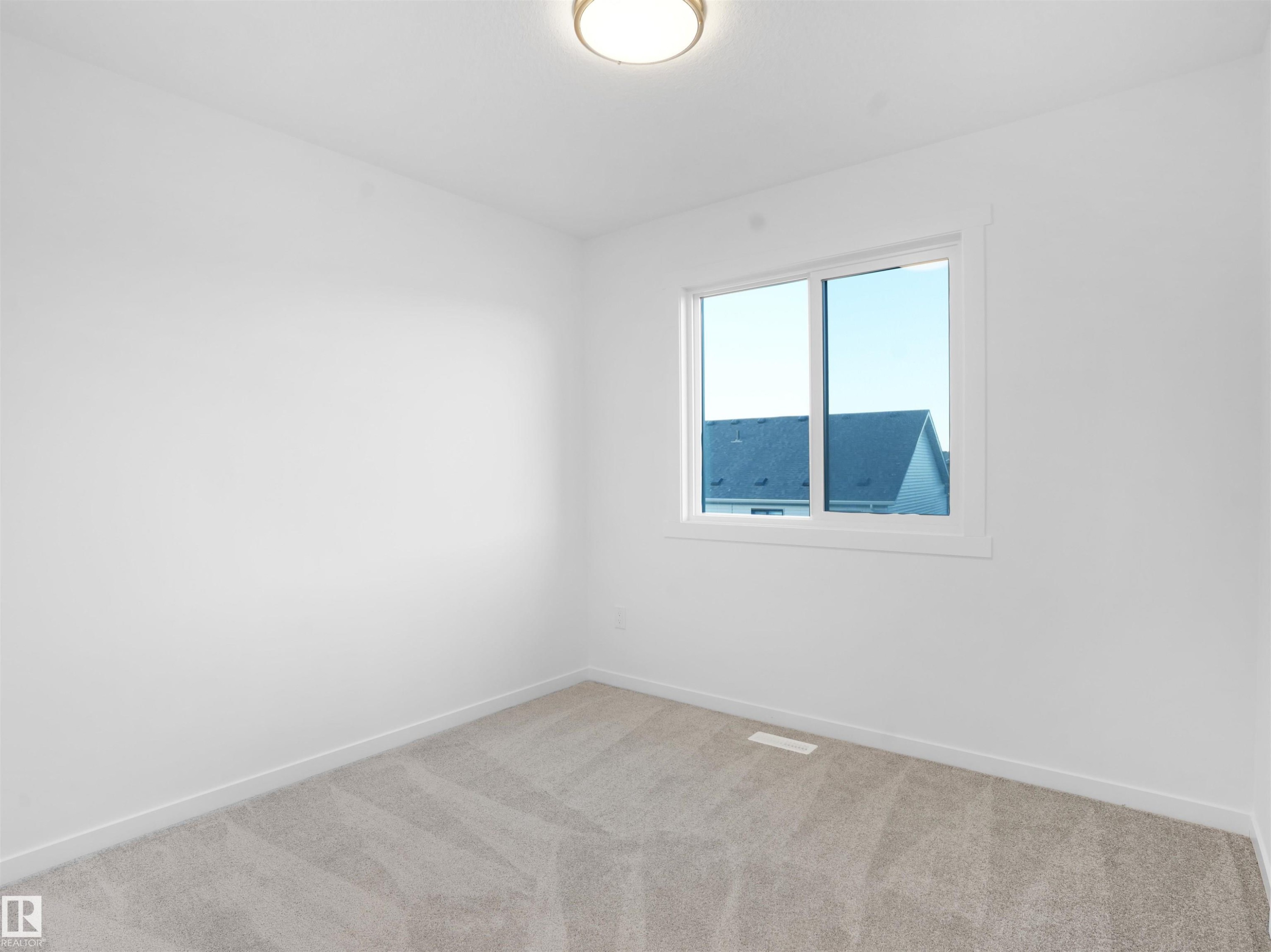 67 525 Secord Boulevard, Edmonton, AB - Indoor Photo Showing Other Room