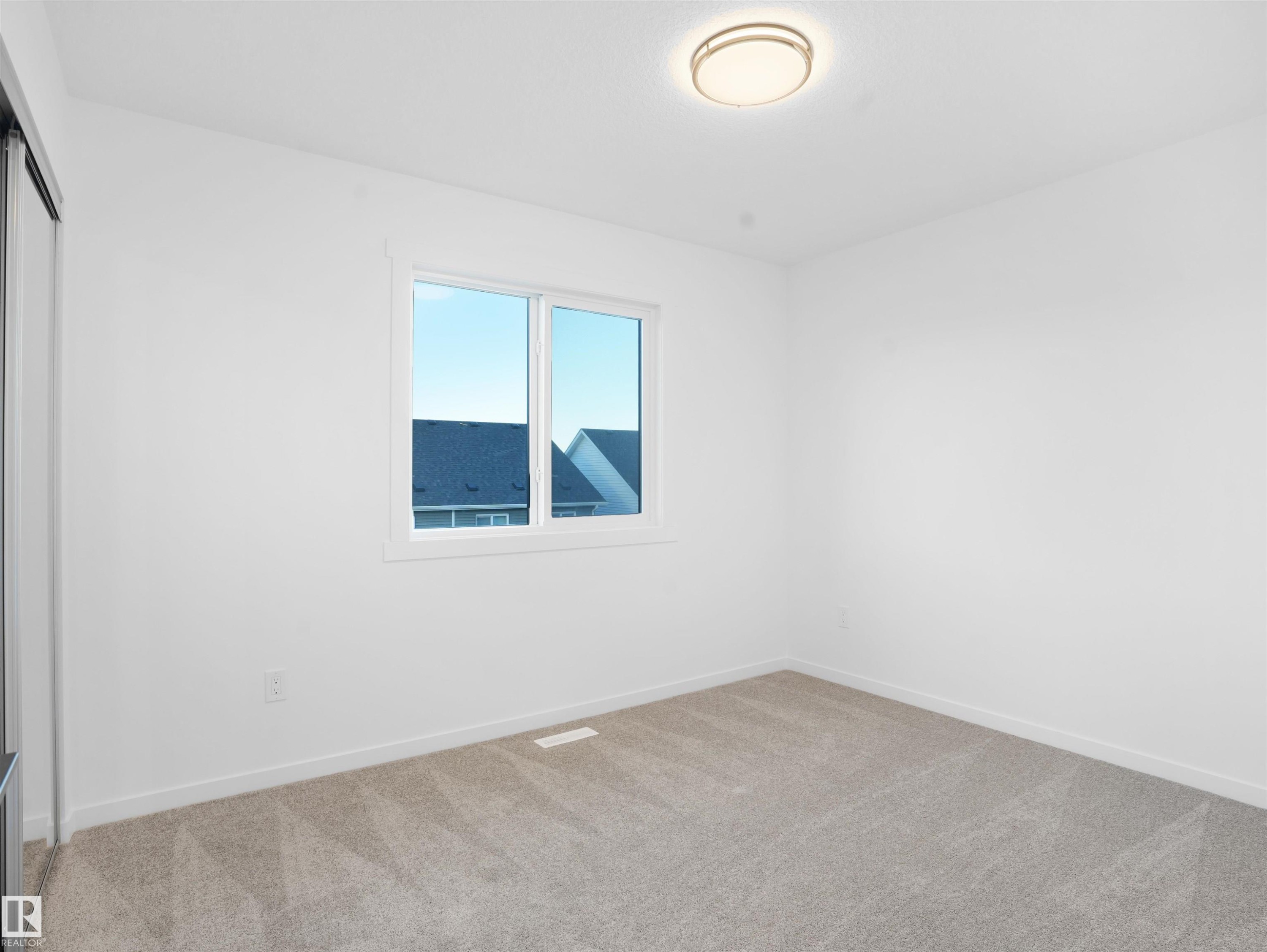 67 525 Secord Boulevard, Edmonton, AB - Indoor Photo Showing Other Room