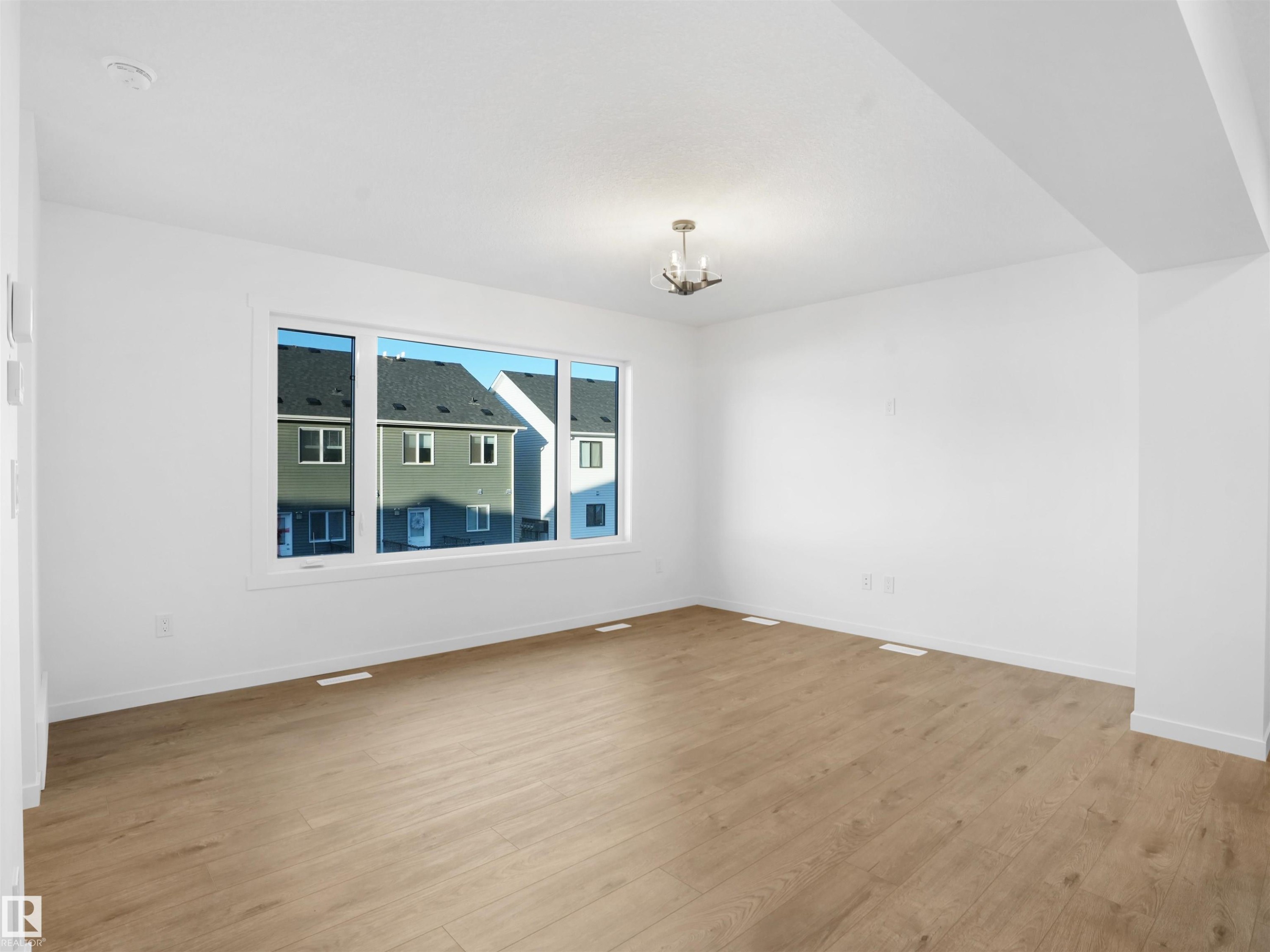 67 525 Secord Boulevard, Edmonton, AB - Indoor Photo Showing Other Room