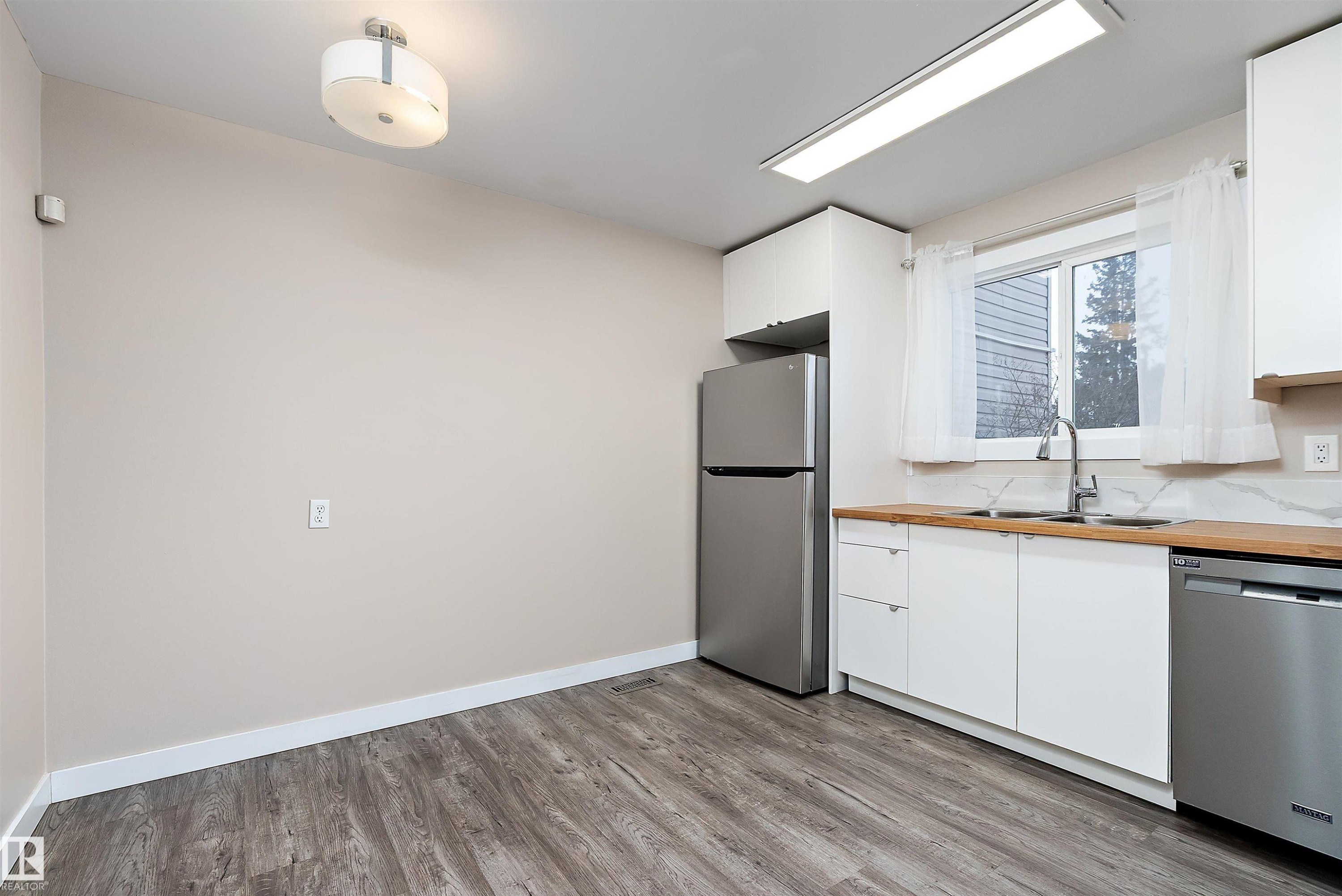 1782 Lakewood Road S, Edmonton, AB - Indoor Photo Showing Kitchen With Stainless Steel Kitchen With Double Sink