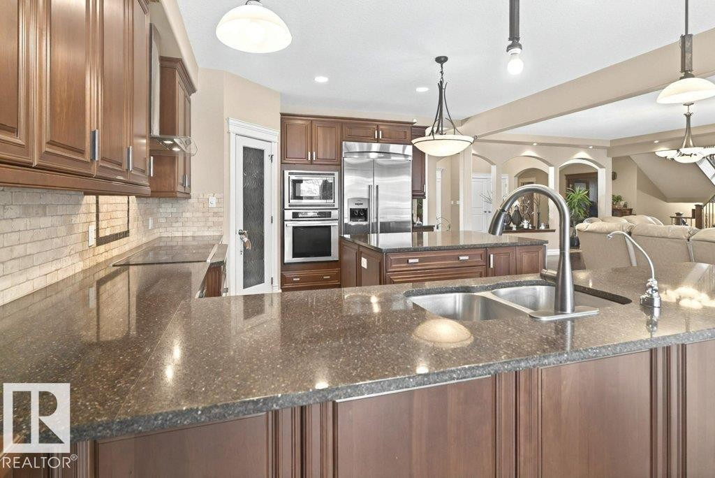 4835 Mactaggart Crest Crest, Edmonton, AB - Indoor Photo Showing Kitchen With Double Sink With Upgraded Kitchen