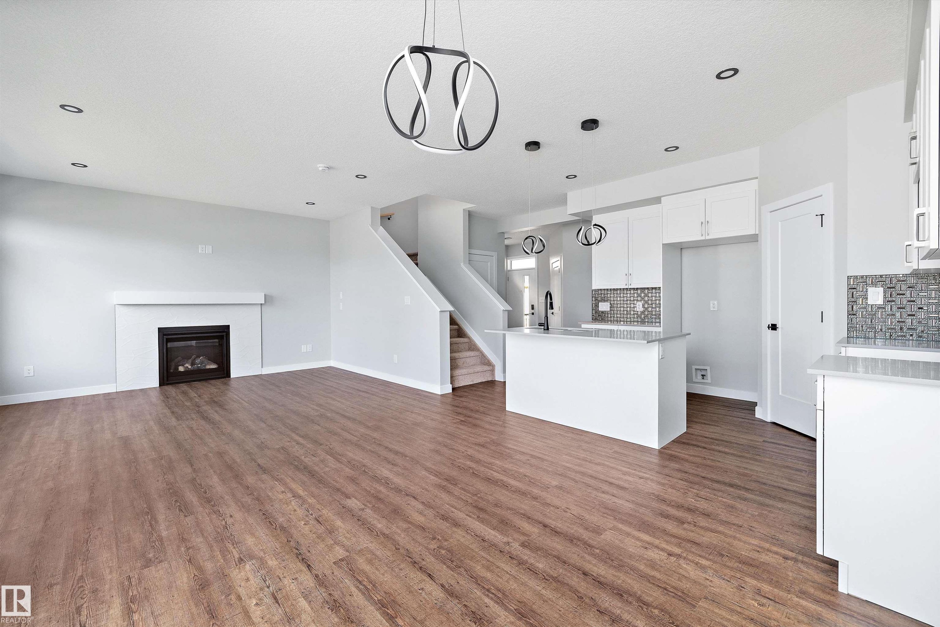 72 Maple Crescent, Gibbons, AB - Indoor Photo Showing Other Room With Fireplace
