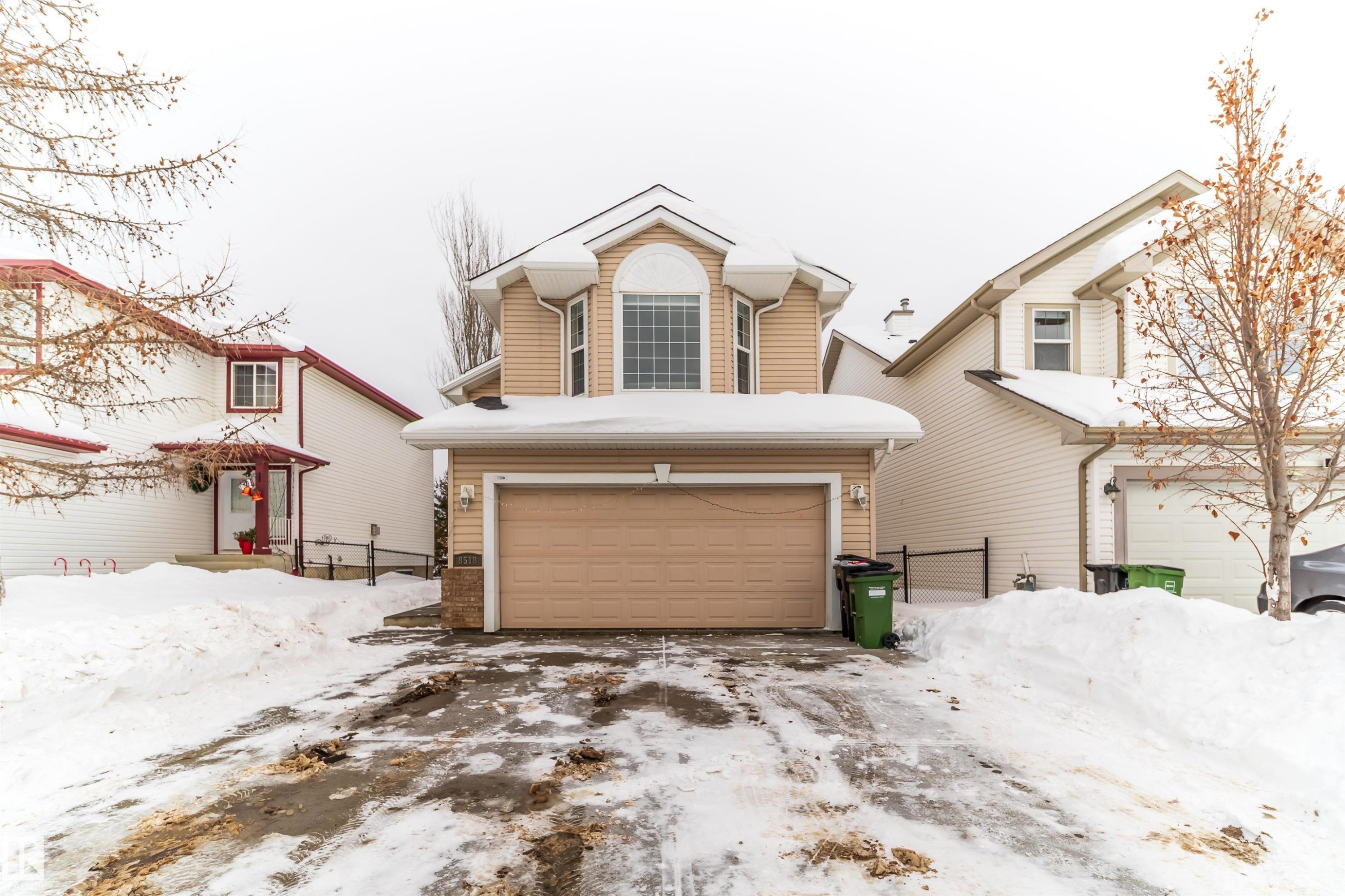 Traditional home with a garage and driveway - 8518 6 Av, Edmonton, AB - Outdoor With Facade