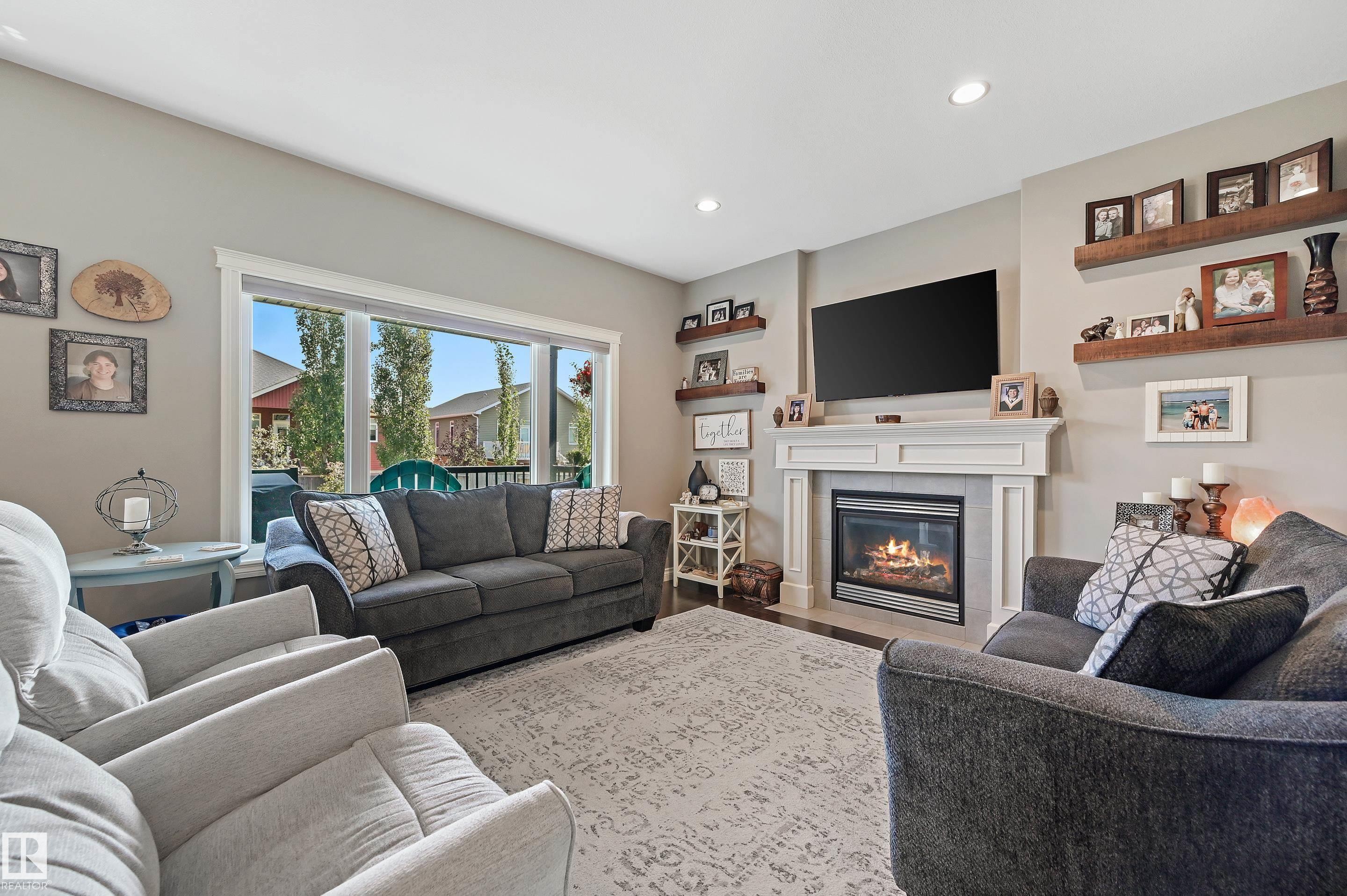 9 Viceroy Crescent, Olds, AB - Indoor Photo Showing Living Room With Fireplace
