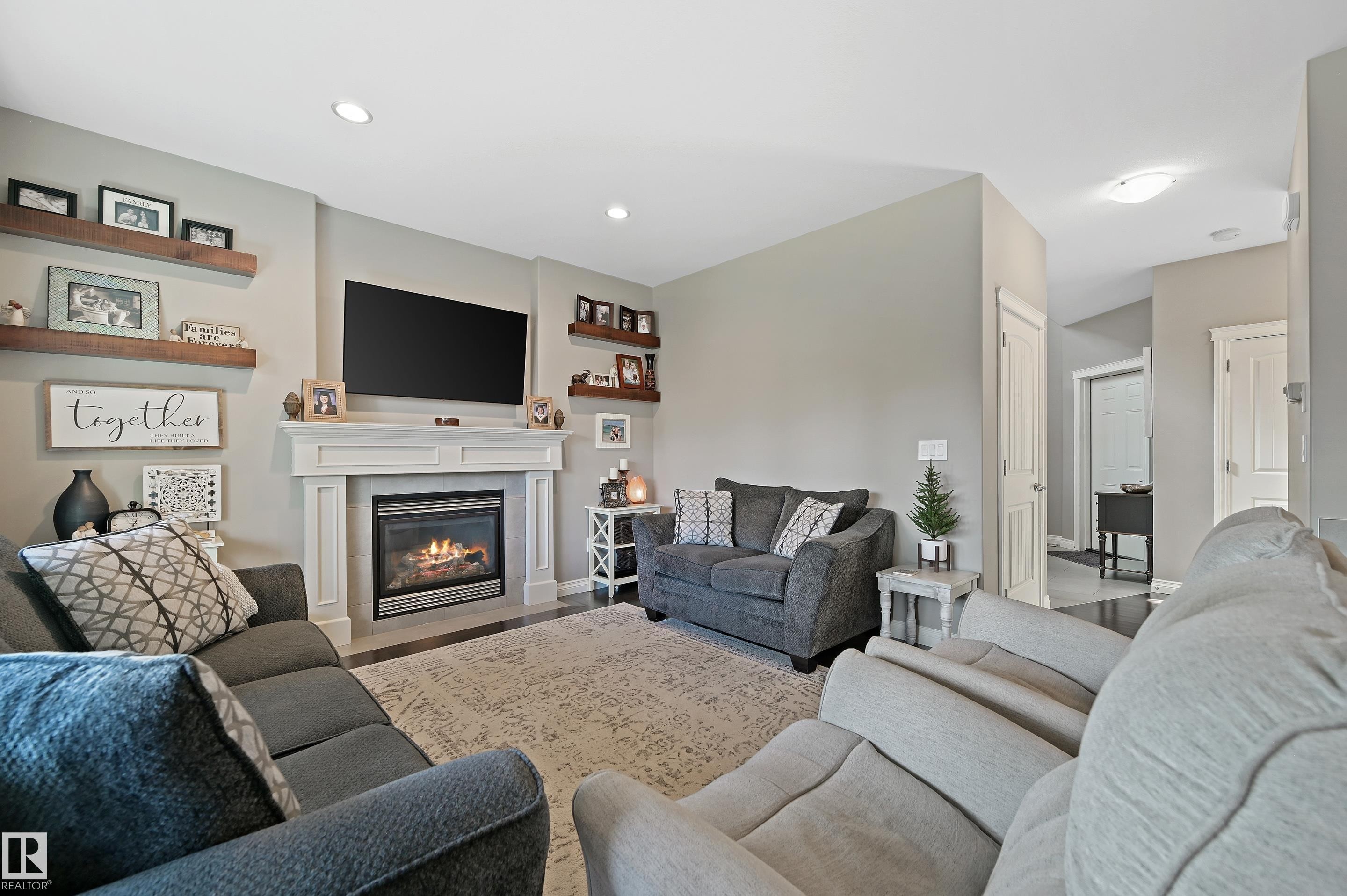 9 Viceroy Crescent, Olds, AB - Indoor Photo Showing Living Room With Fireplace