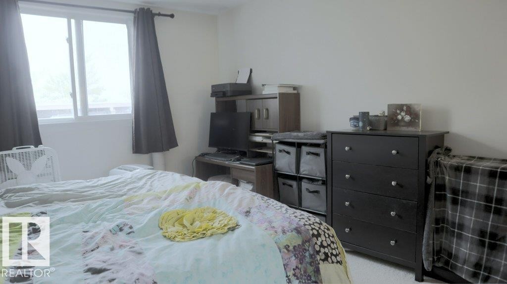 111 5125 Riverbend Road, Edmonton, AB - Indoor Photo Showing Bedroom