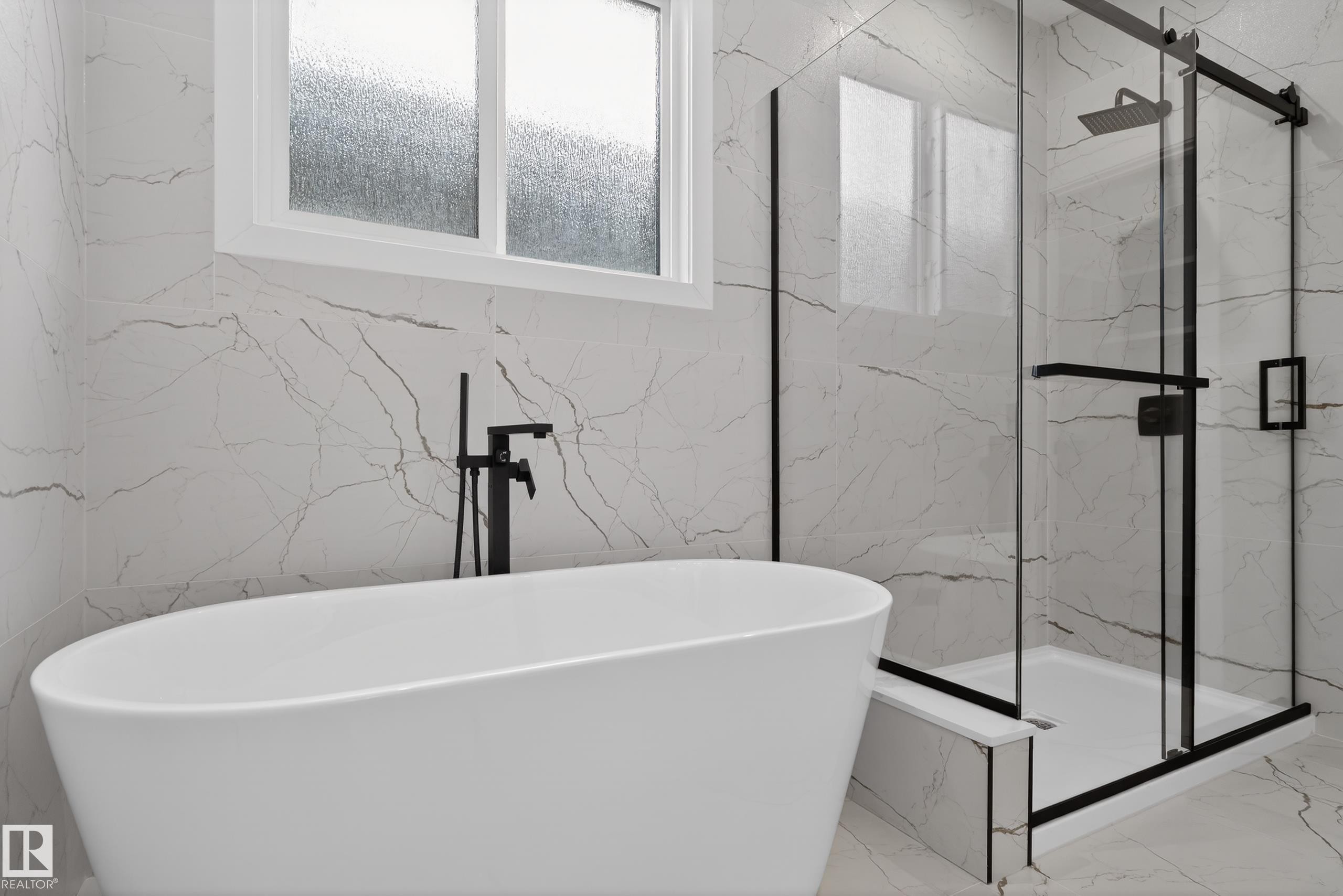 Full bathroom with a marble finish shower, a soaking tub, and marble tiled flooring - 19 Rosa Crescent, St. Albert, AB - Indoor Photo Showing Bathroom