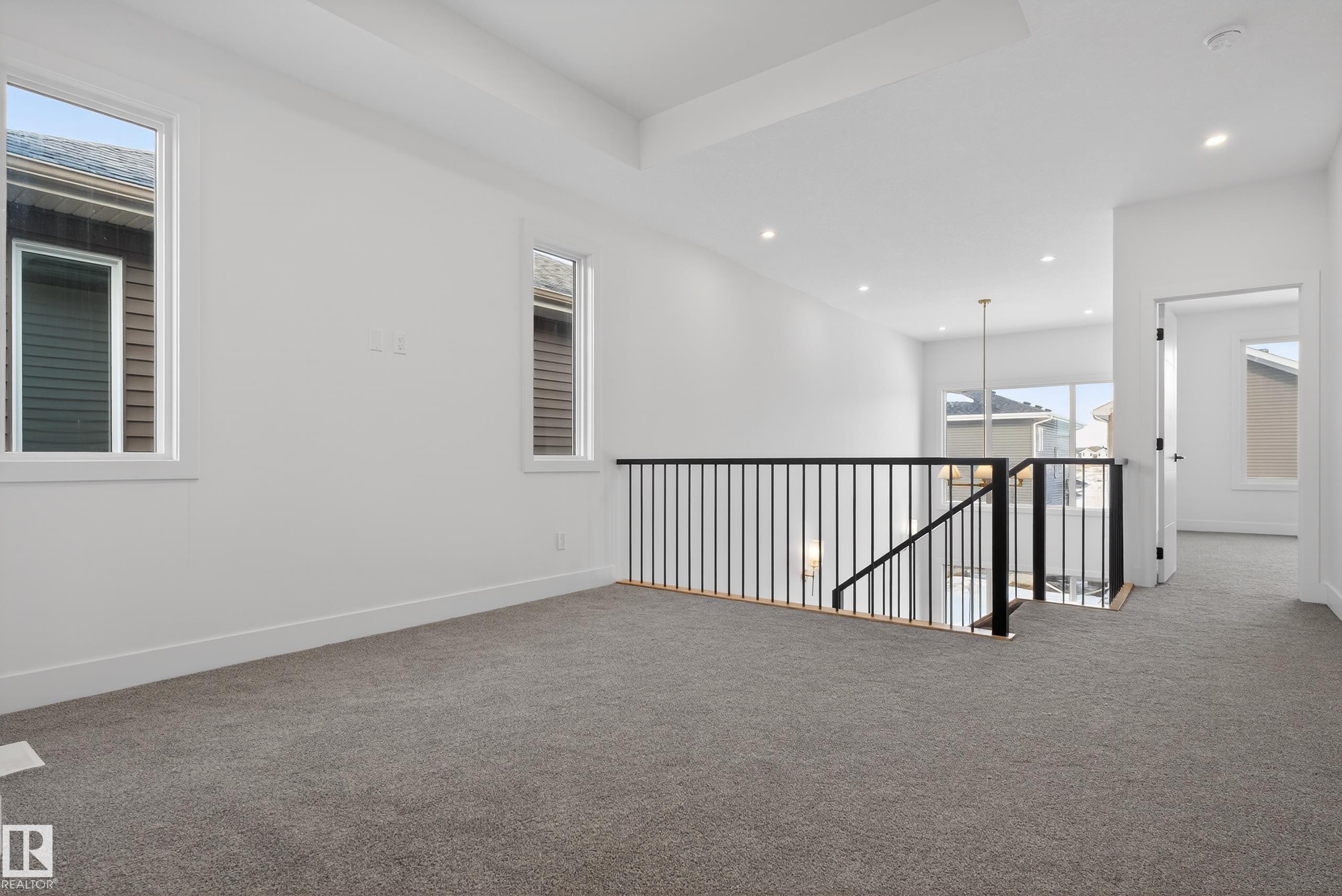 Carpeted empty room with baseboards and recessed lighting - 19 Rosa Crescent, St. Albert, AB - Indoor Photo Showing Other Room