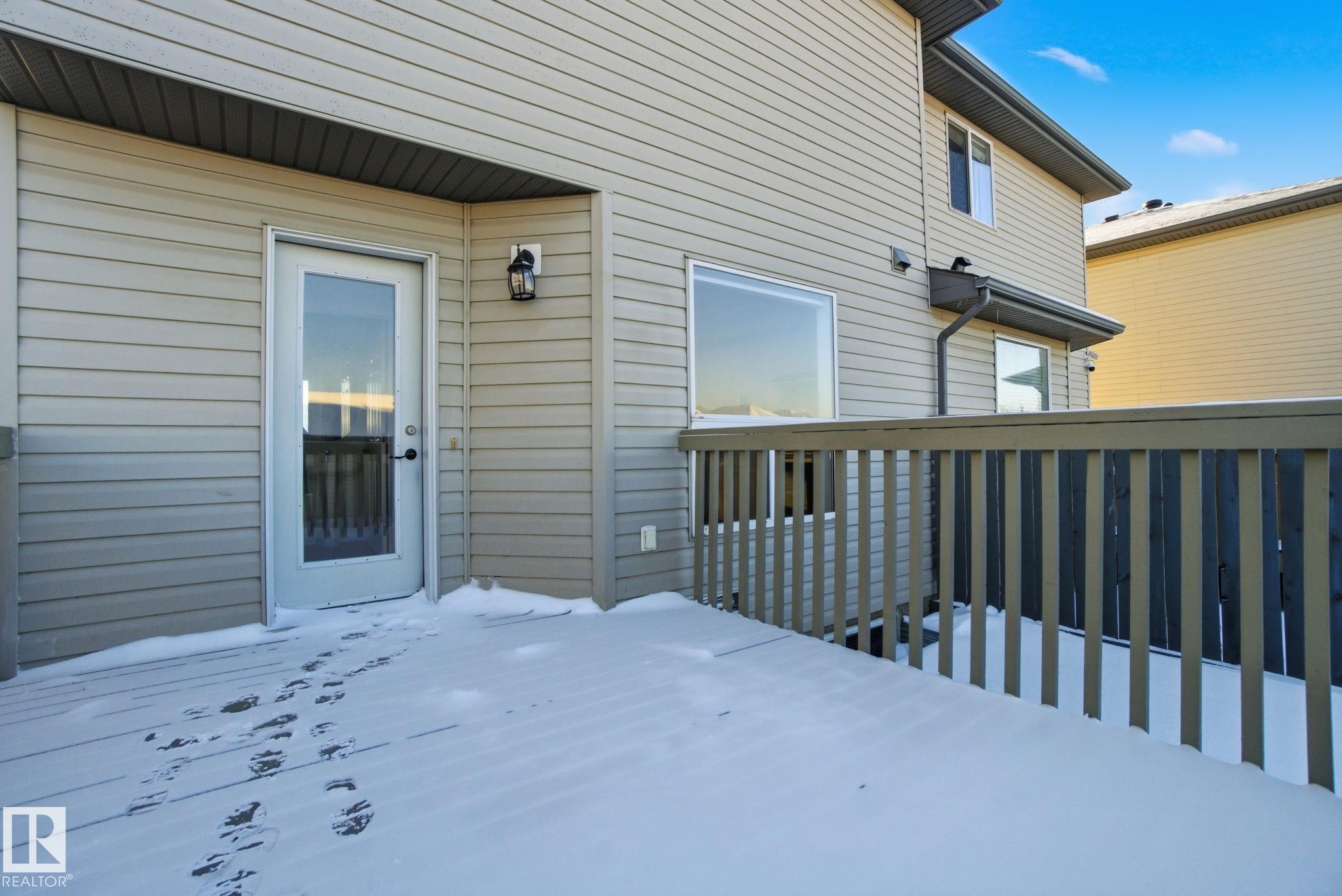 Entrance to property with newly painted deck - 3014 31 Avenue, Edmonton, AB - Outdoor With Exterior