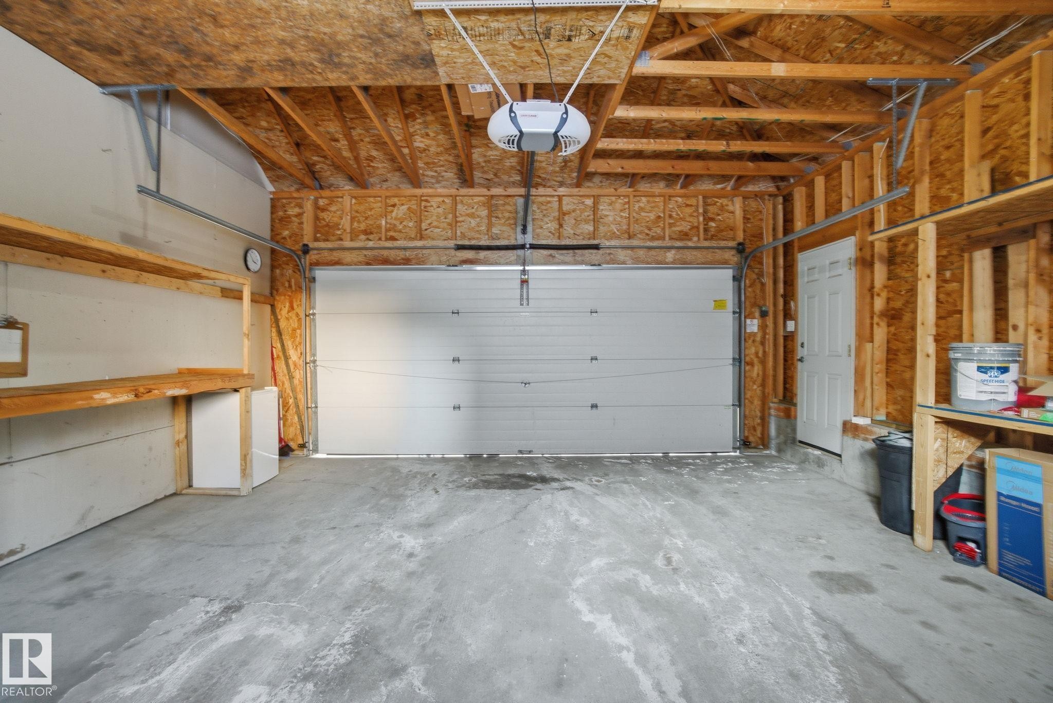 Double detached garage interior - 3014 31 Avenue, Edmonton, AB - Indoor Photo Showing Garage