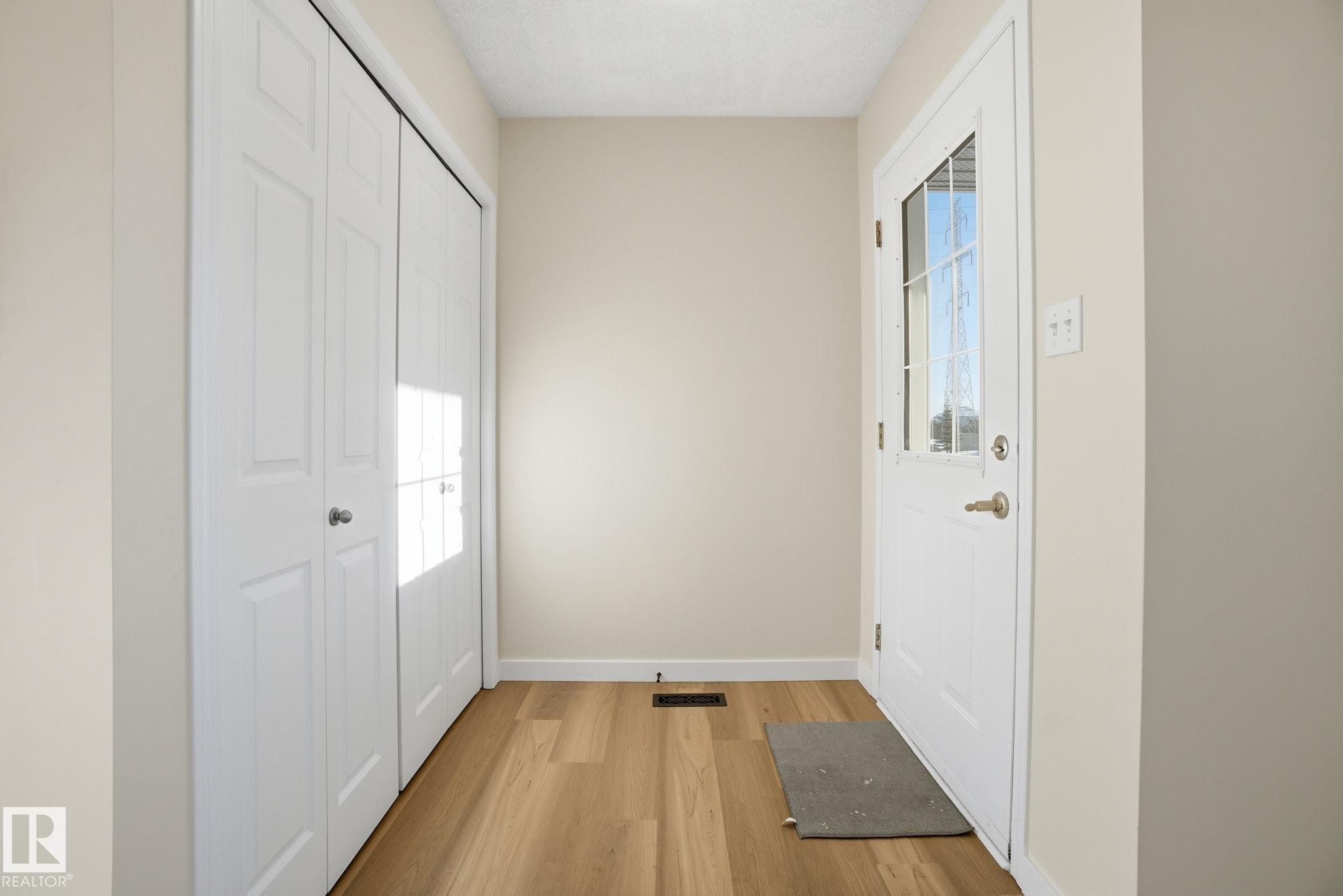 Entryway with plenty of natural light and wood finished floors - 3014 31 Avenue, Edmonton, AB - Indoor Photo Showing Other Room