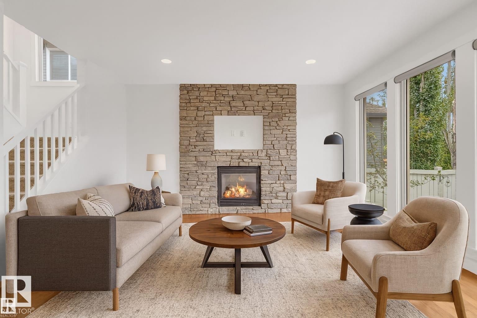 Edmonton, AB - Indoor Photo Showing Living Room With Fireplace