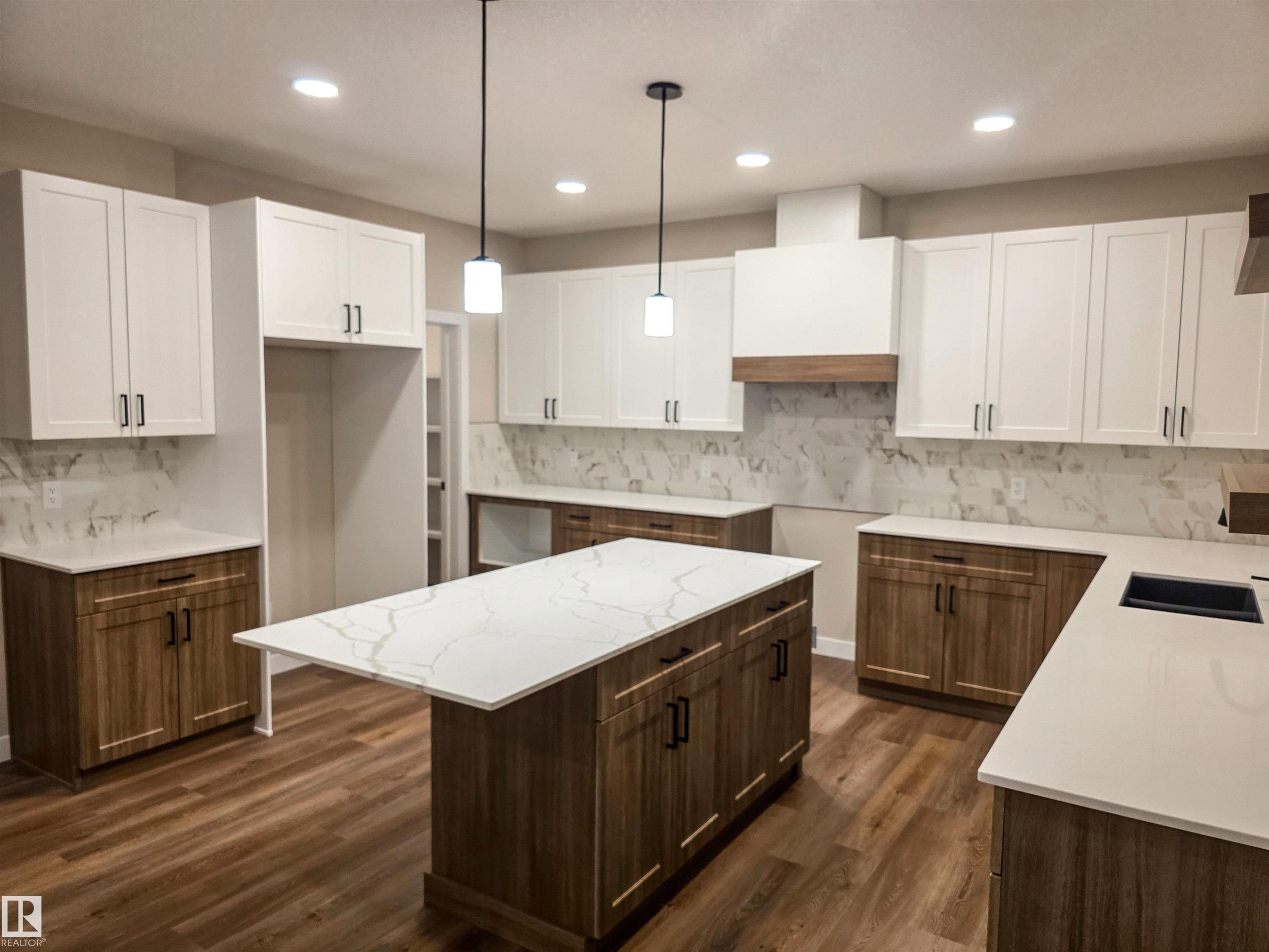 3 Emerson Landing, Spruce Grove, AB - Indoor Photo Showing Kitchen With Double Sink