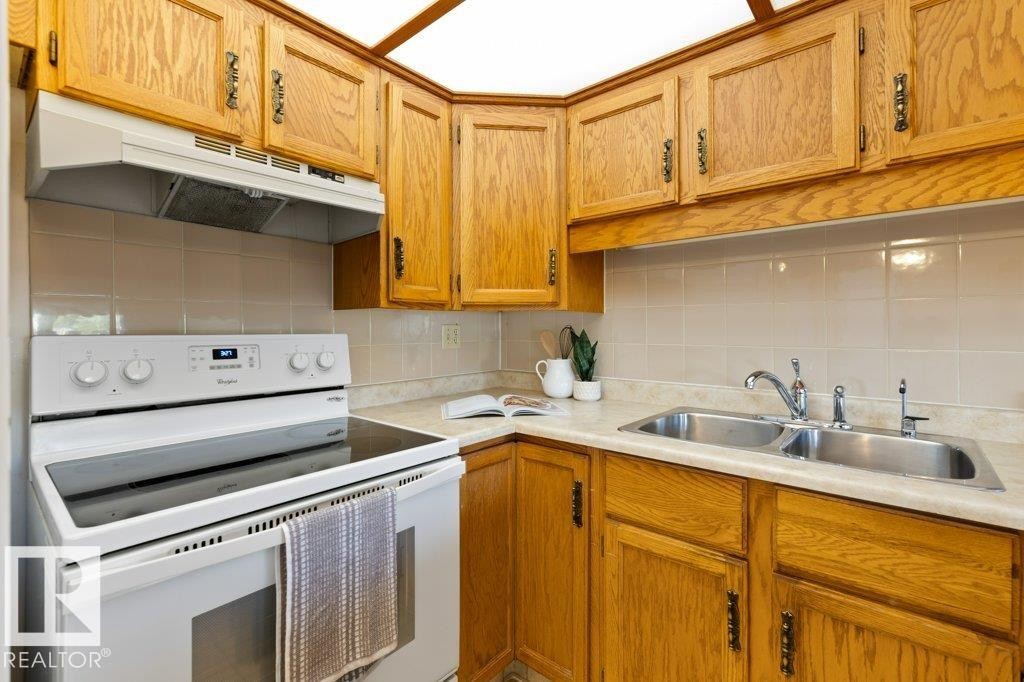 Edmonton, AB - Indoor Photo Showing Kitchen With Double Sink