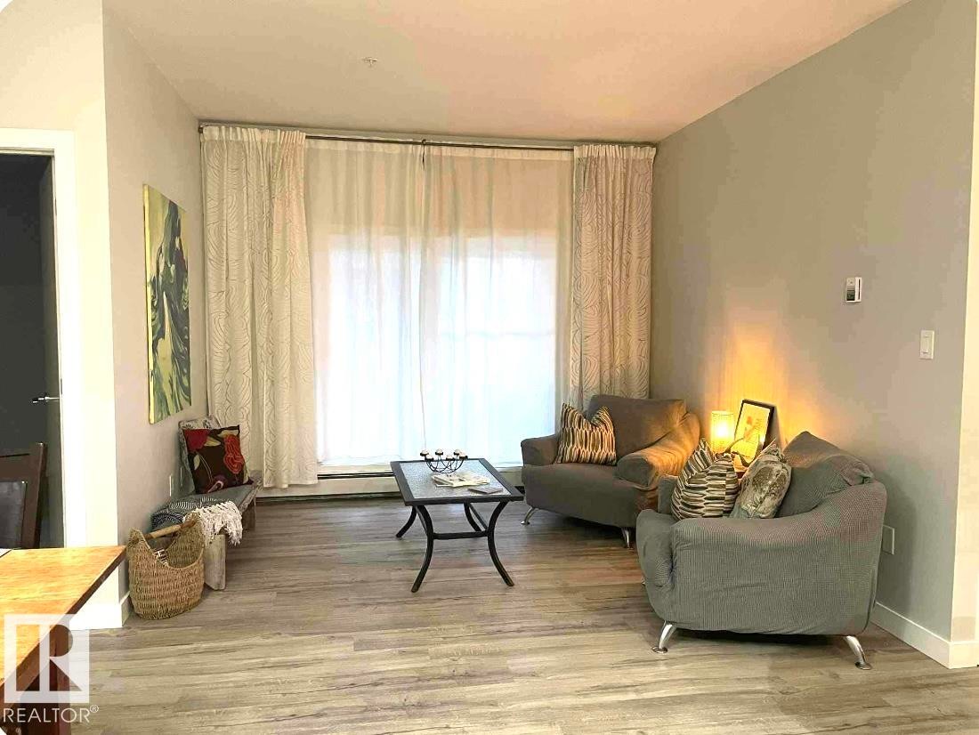 107 10611 117 Street, Edmonton, AB - Indoor Photo Showing Living Room