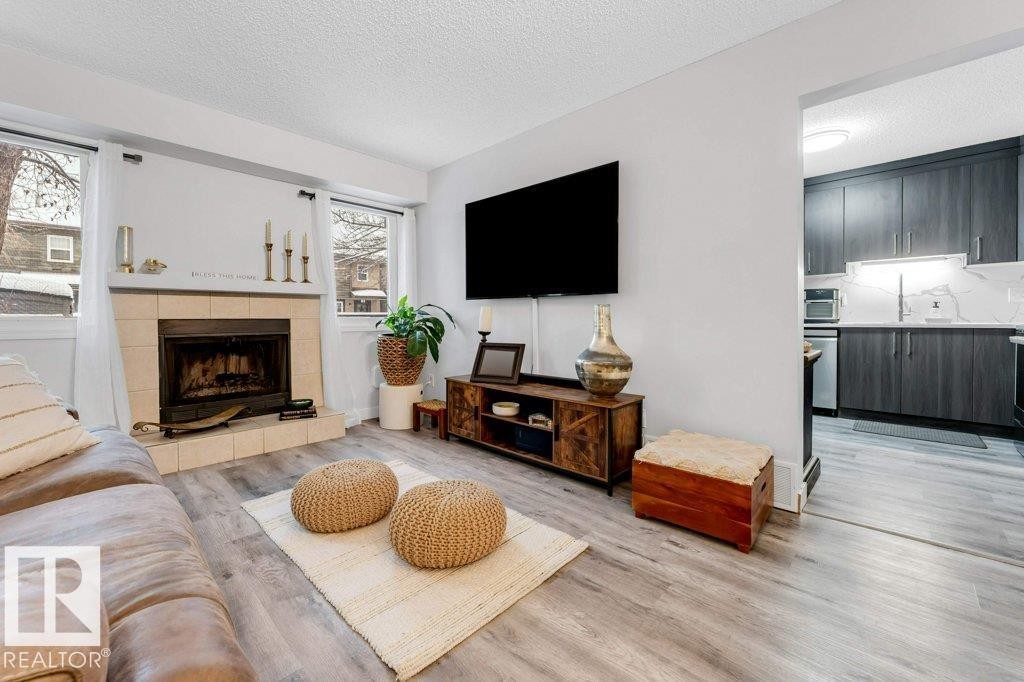18010 96 Ave, Edmonton, AB - Indoor Photo Showing Living Room With Fireplace