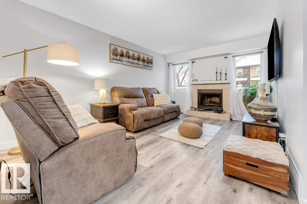 18010 96 Ave, Edmonton, AB - Indoor Photo Showing Living Room With Fireplace