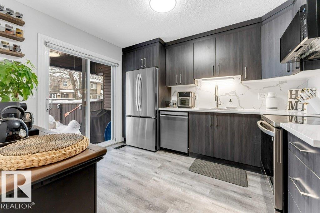 18010 96 Ave, Edmonton, AB - Indoor Photo Showing Kitchen With Stainless Steel Kitchen With Upgraded Kitchen
