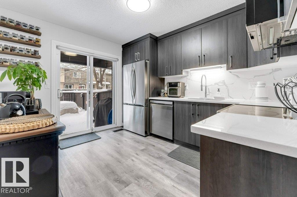 18010 96 Ave, Edmonton, AB - Indoor Photo Showing Kitchen With Stainless Steel Kitchen With Upgraded Kitchen