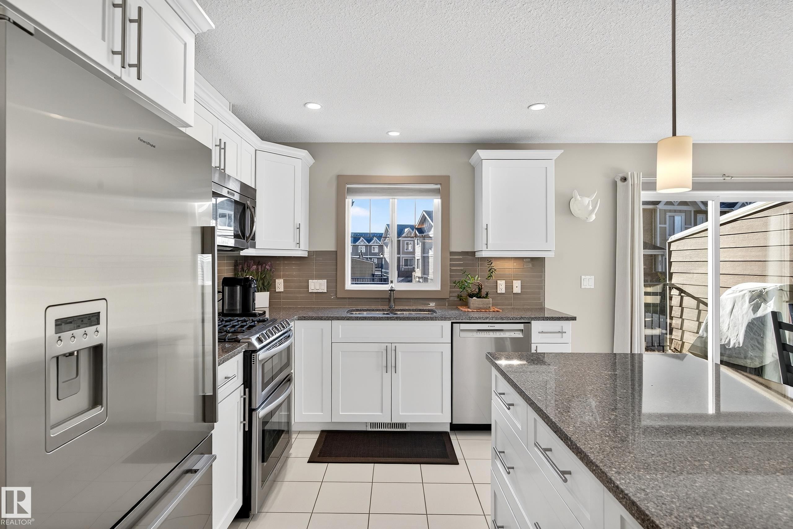 6 1150 Winderemere Way, Edmonton, AB - Indoor Photo Showing Kitchen With Stainless Steel Kitchen With Upgraded Kitchen