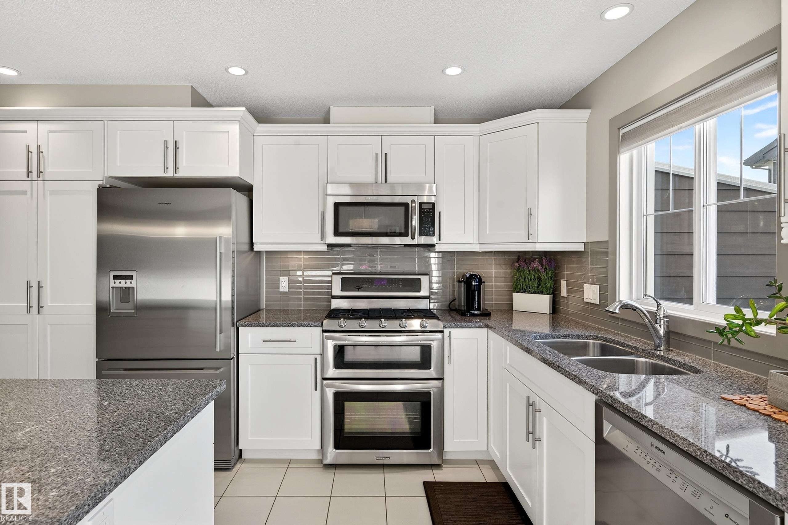 6 1150 Winderemere Way, Edmonton, AB - Indoor Photo Showing Kitchen With Stainless Steel Kitchen With Double Sink With Upgraded Kitchen