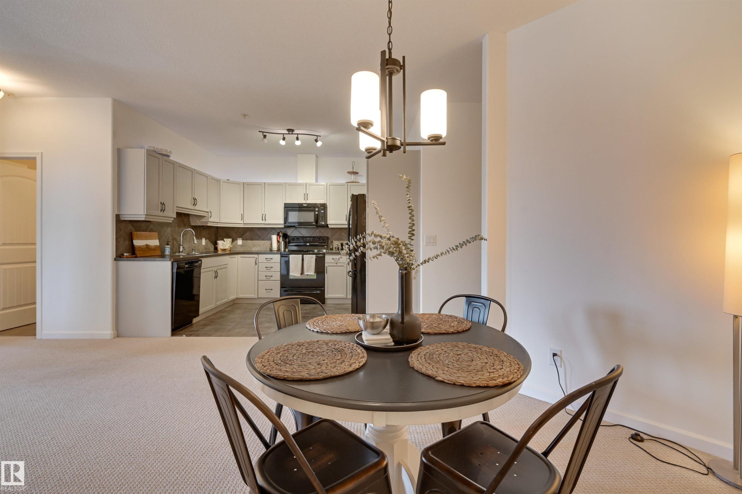 221 6083 Maynard Way, Edmonton, AB - Indoor Photo Showing Dining Room